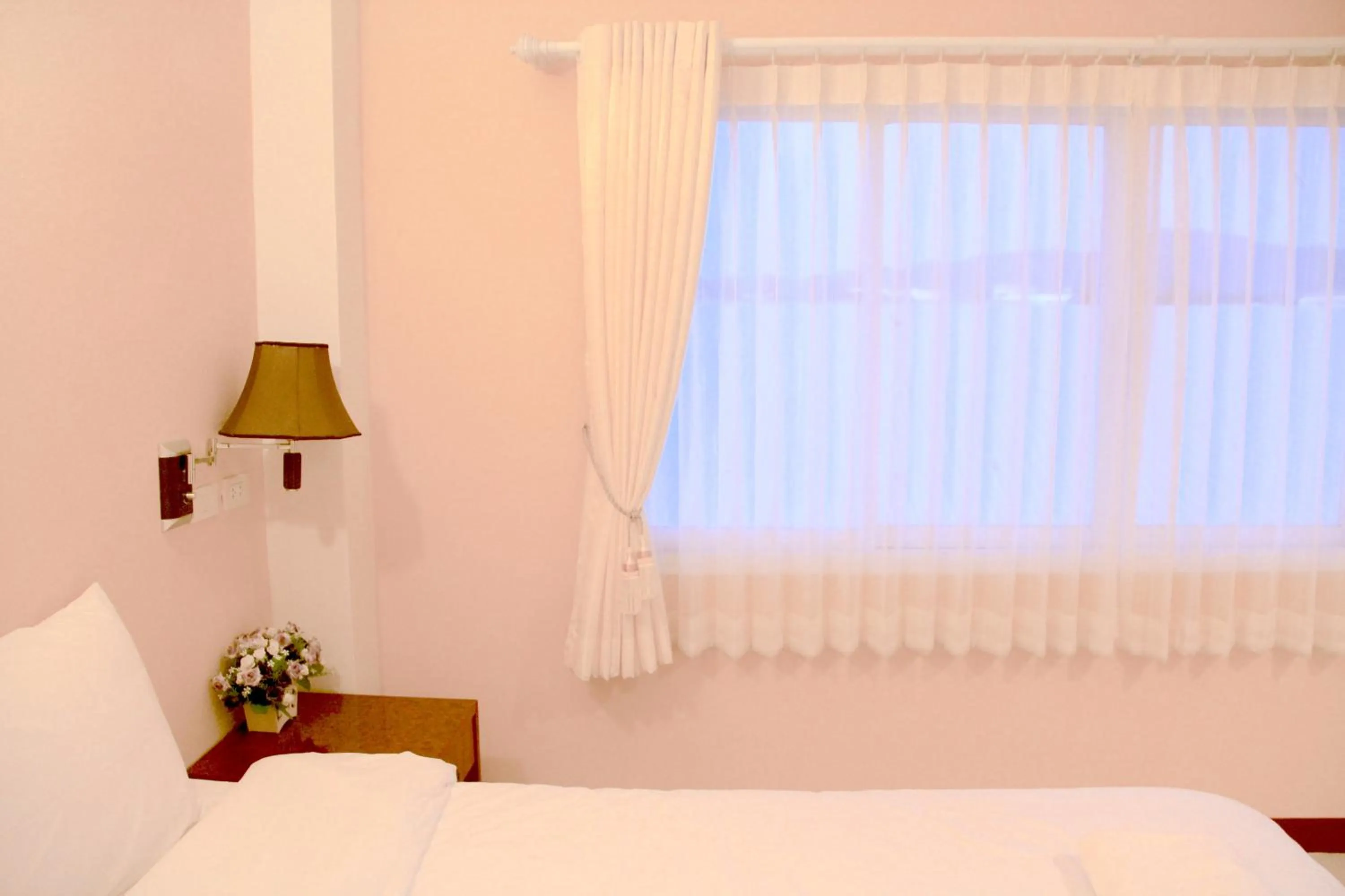 Bed in The Cottage Lampang