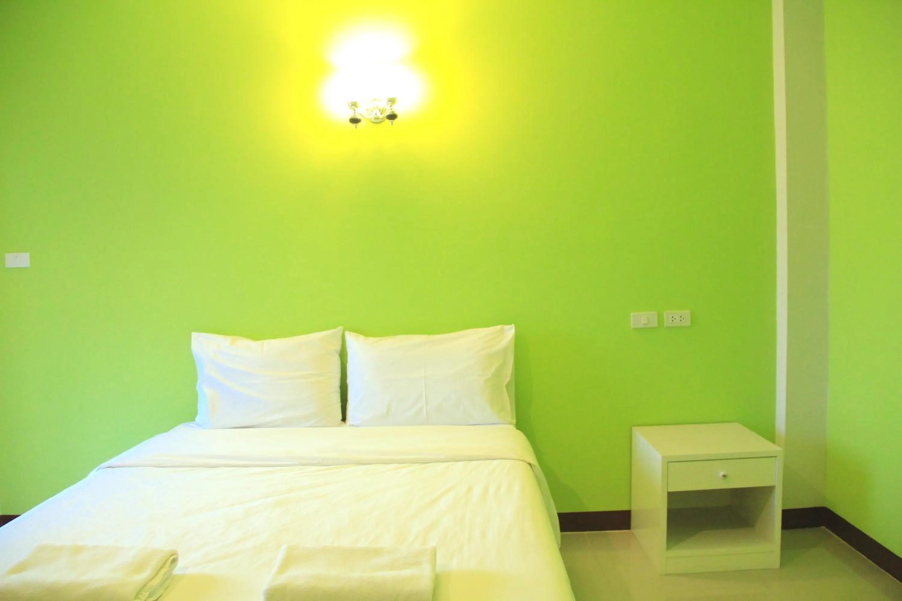 Bed in The Cottage Lampang