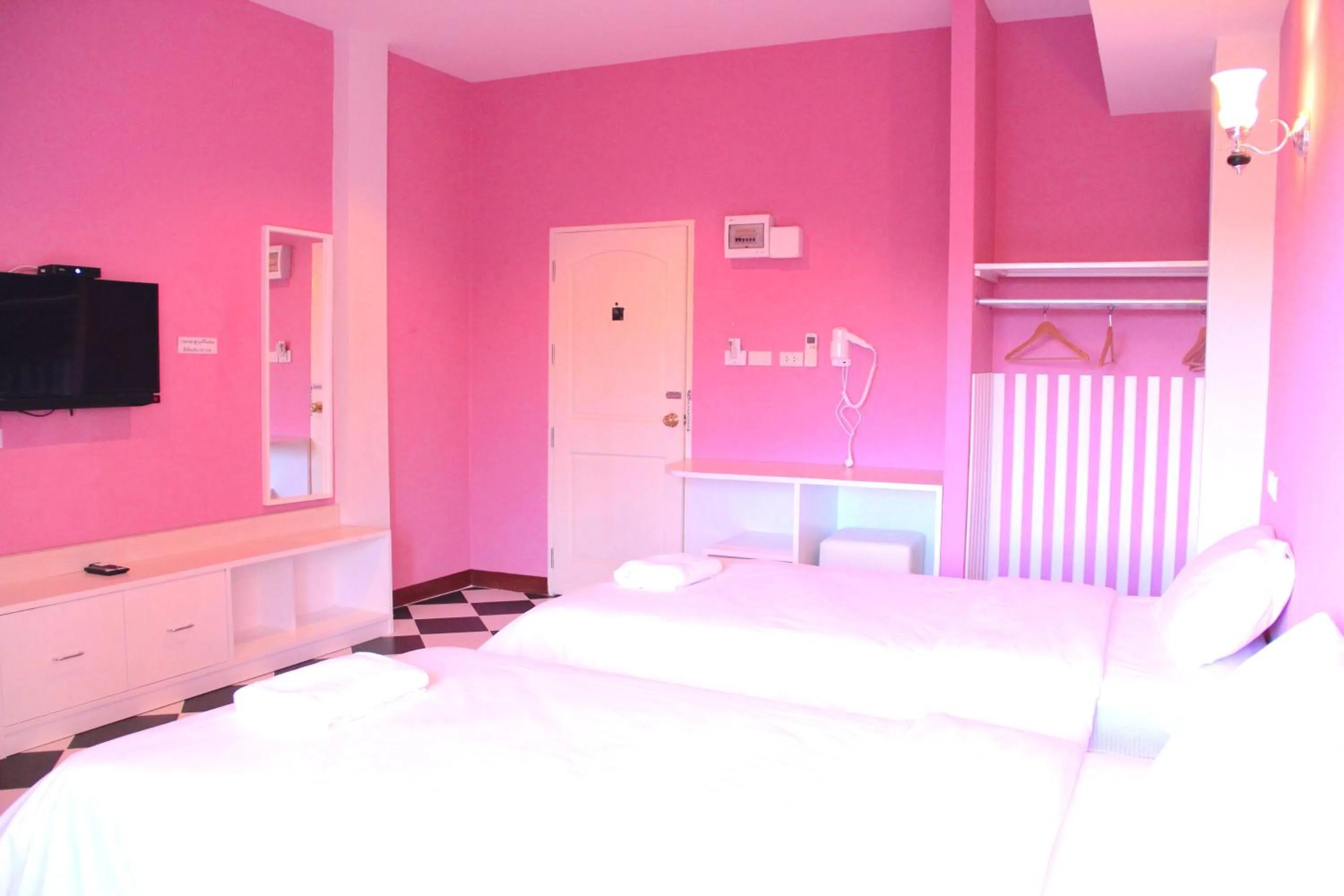 Bed in The Cottage Lampang