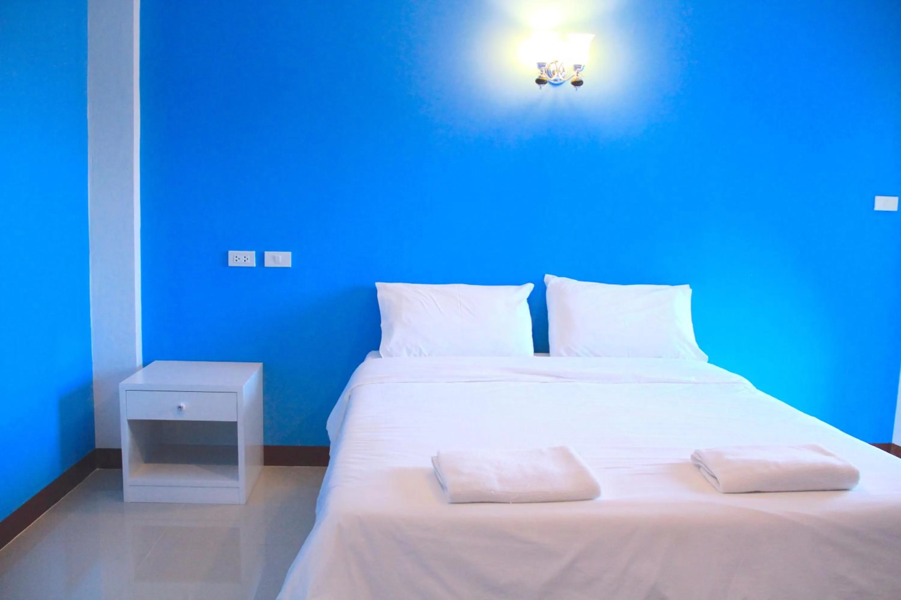 Bed in The Cottage Lampang