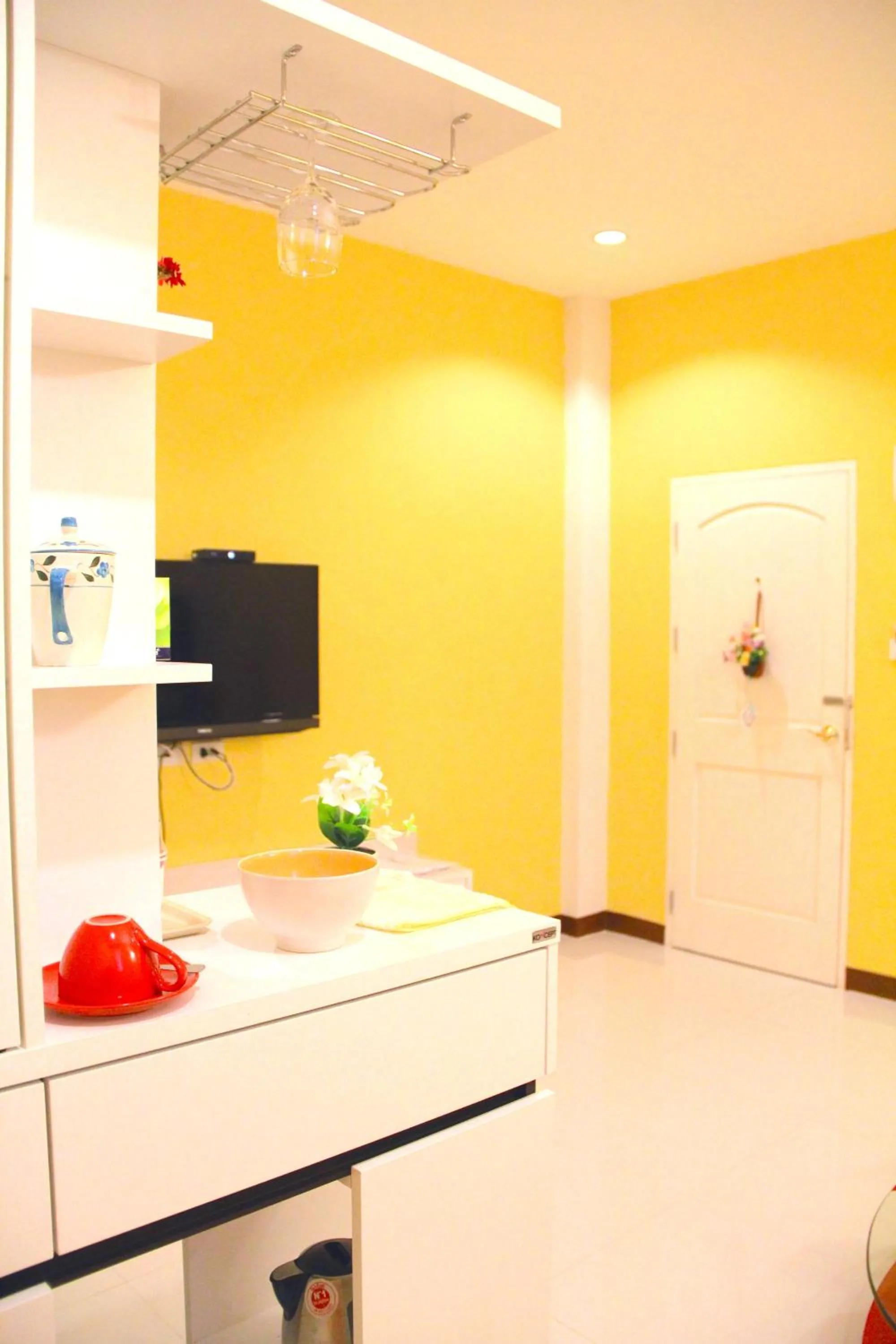 Kitchen or kitchenette in The Cottage Lampang