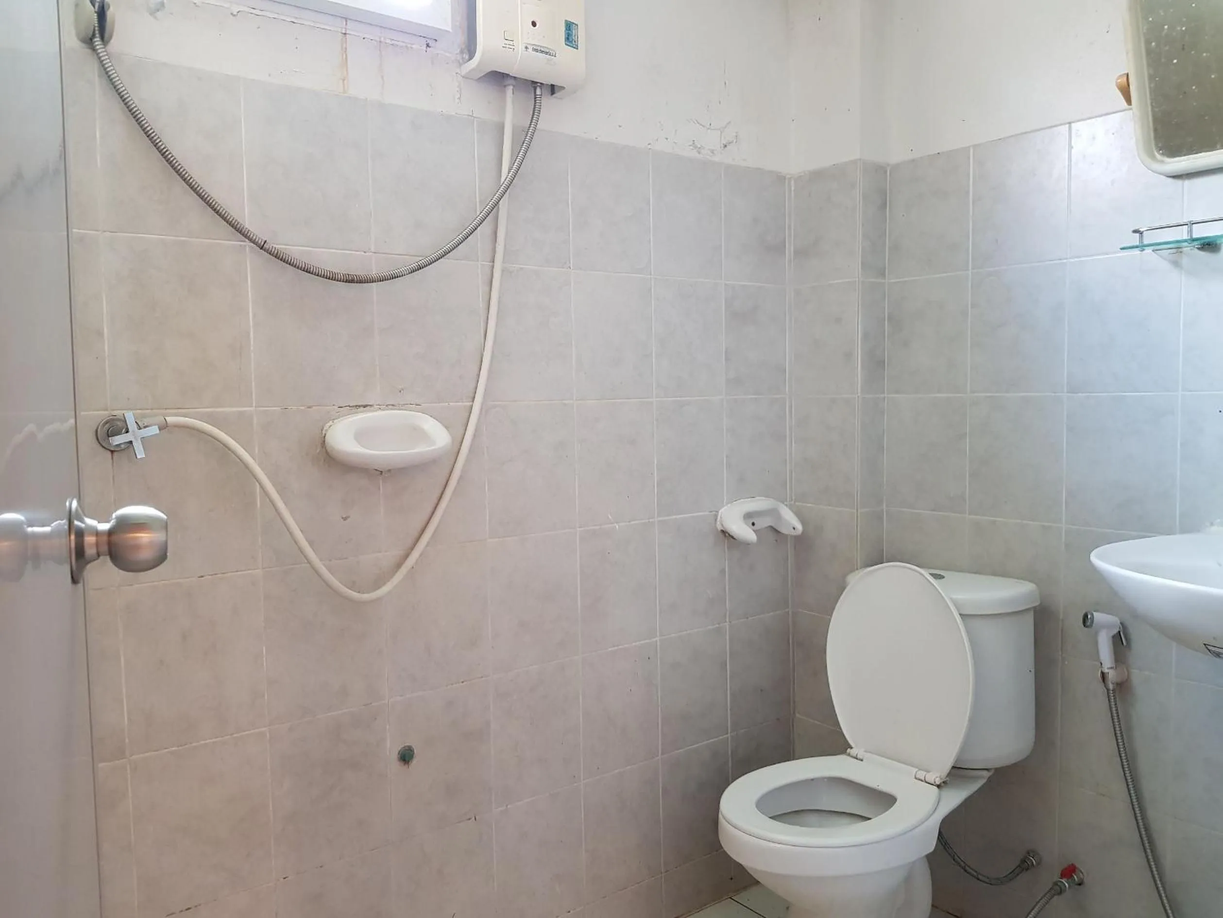 Bathroom in Punya Garden Hotel