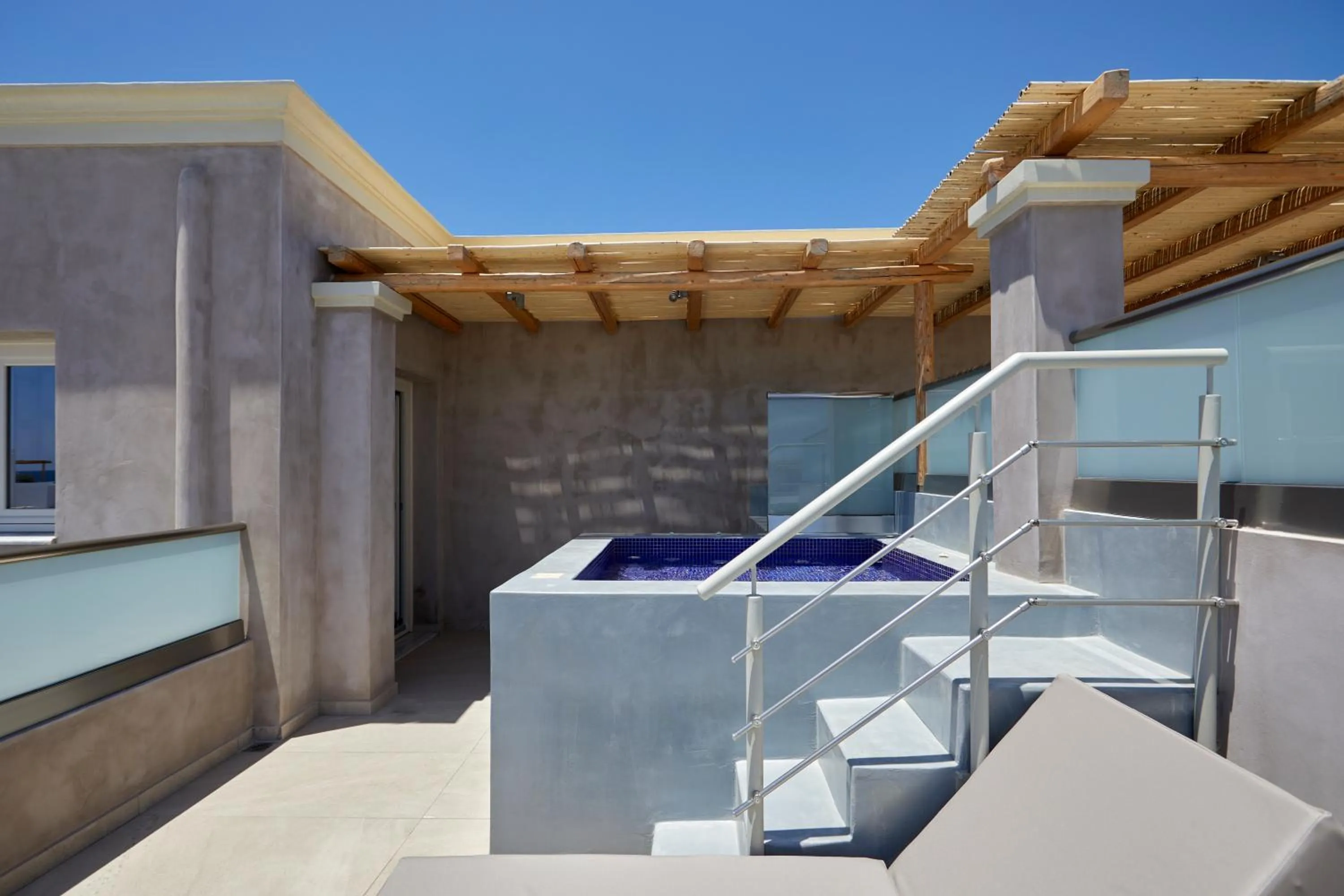 Hot Tub in Sea Breeze Santorini Beach Resort, Curio By Hilton