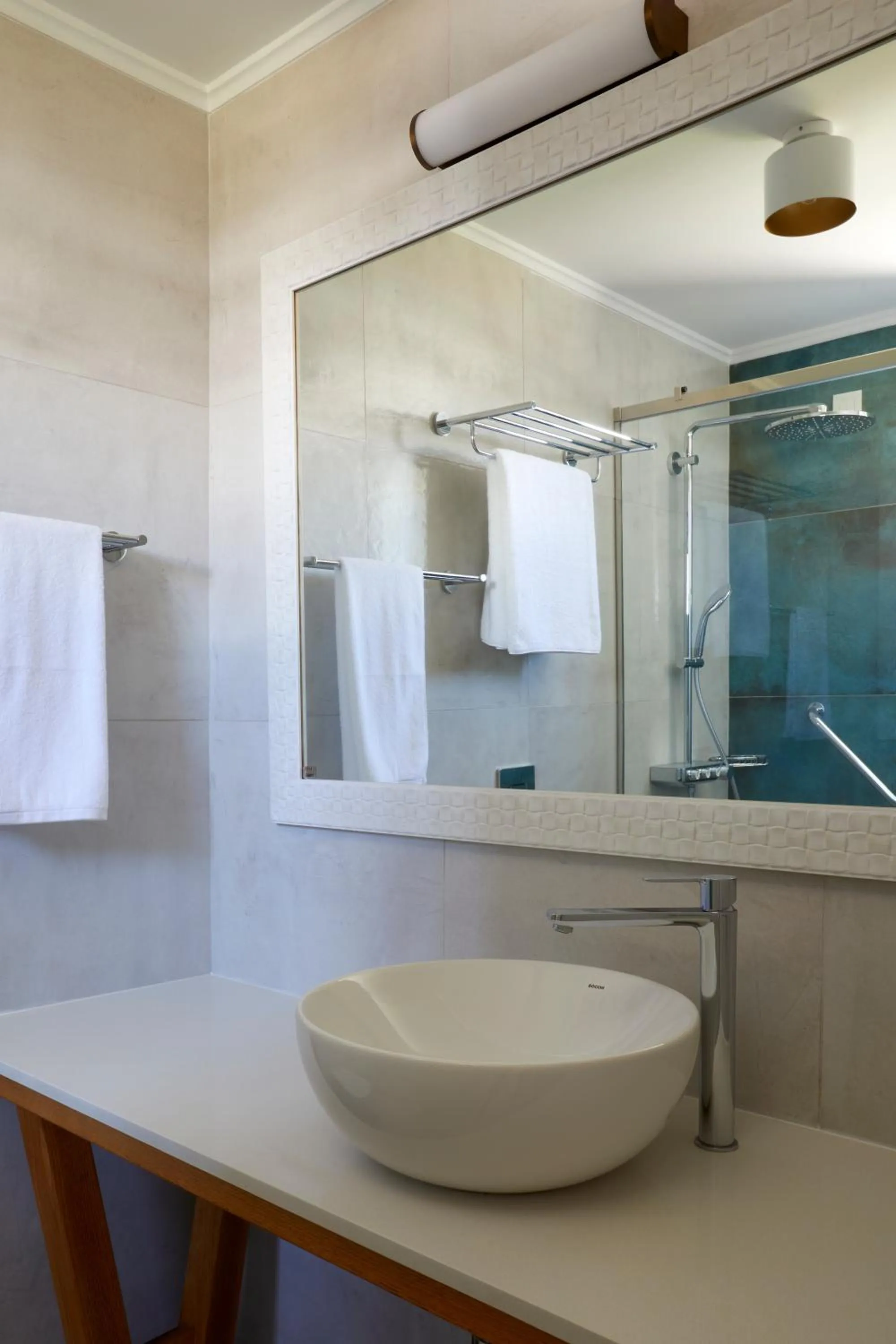 Bathroom in Sea Breeze Santorini Beach Resort, Curio By Hilton