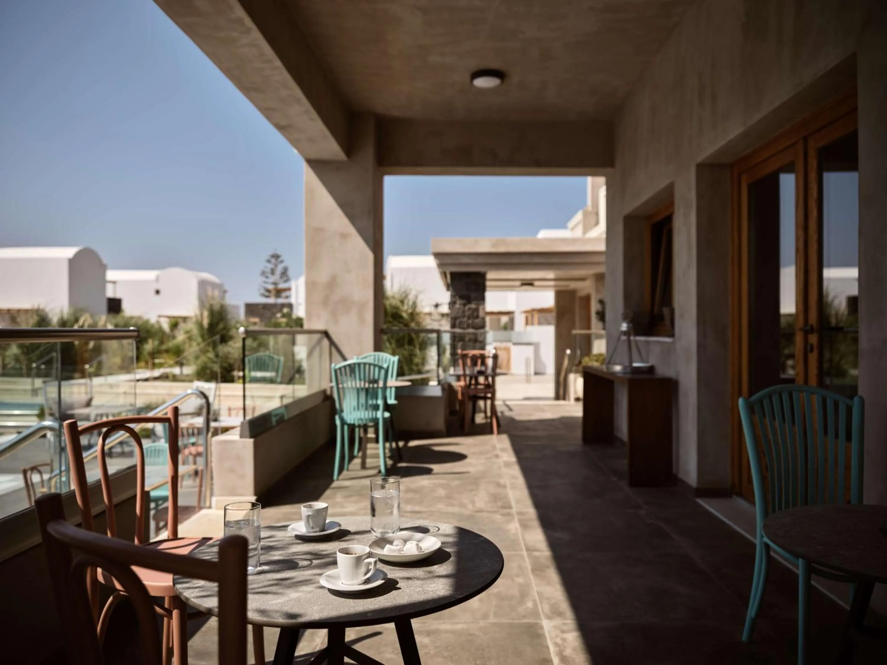 Restaurant/places to eat in Sea Breeze Santorini Beach Resort, Curio By Hilton