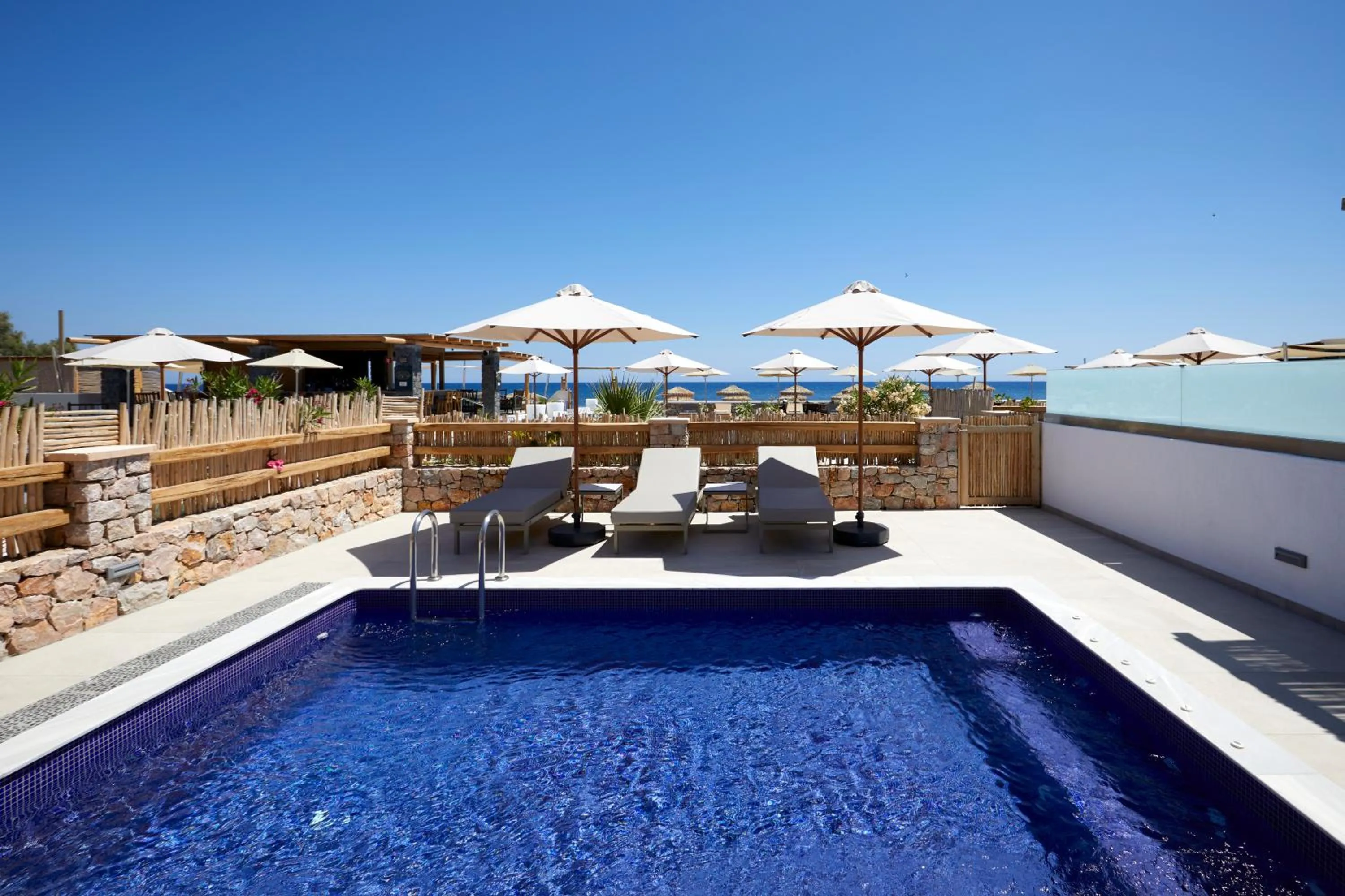 Balcony/Terrace in Sea Breeze Santorini Beach Resort, Curio By Hilton