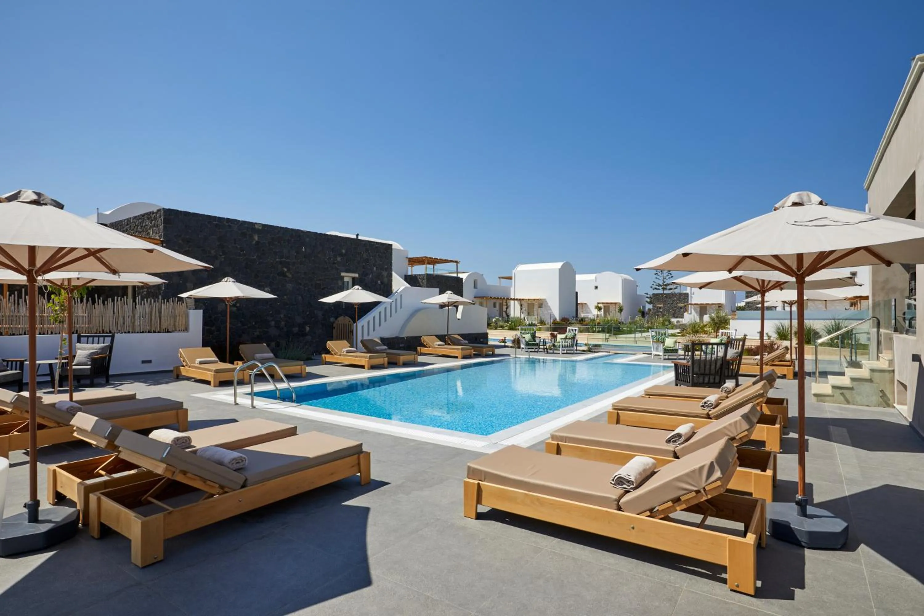 Property building in Sea Breeze Santorini Beach Resort, Curio By Hilton