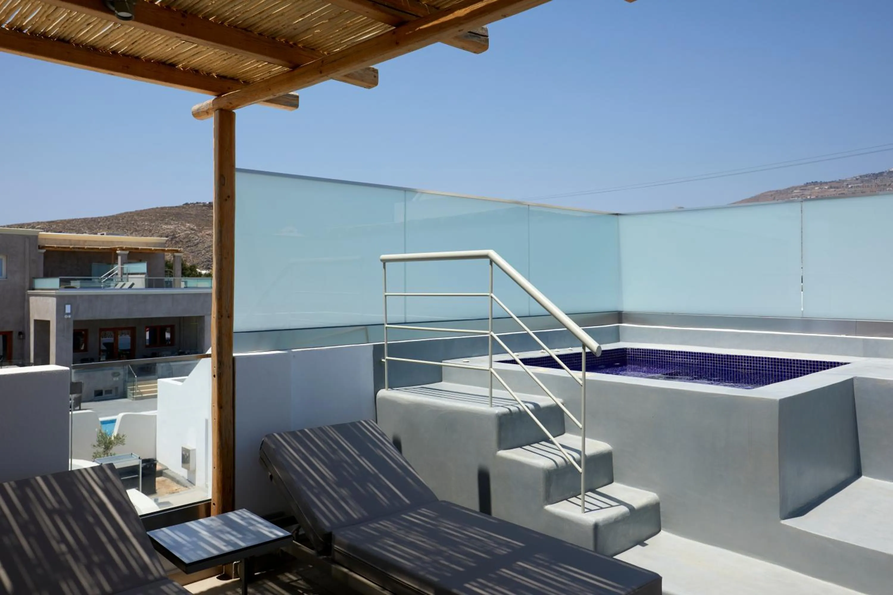 Hot Tub in Sea Breeze Santorini Beach Resort, Curio By Hilton