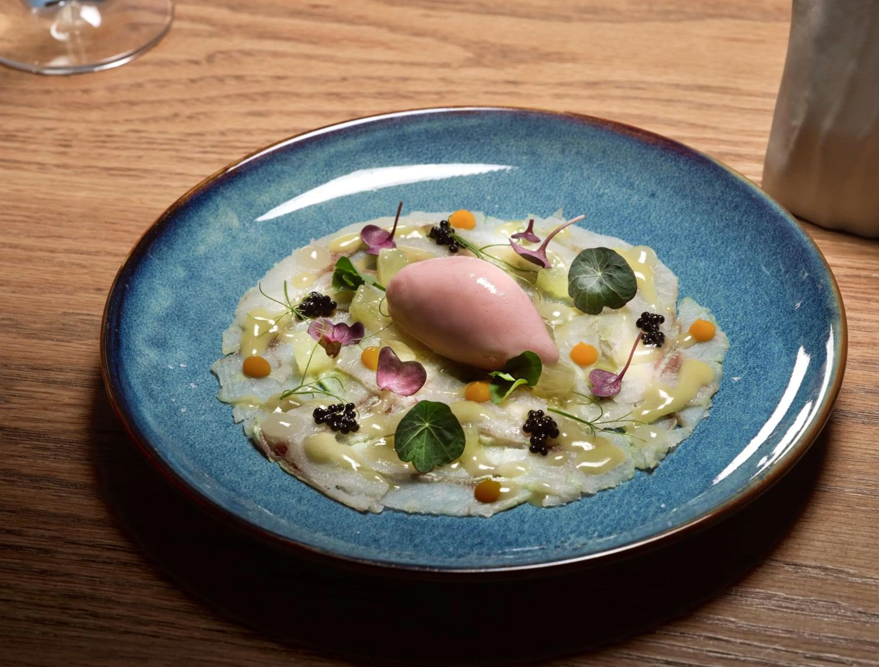 Restaurant/places to eat in Sea Breeze Santorini Beach Resort, Curio By Hilton