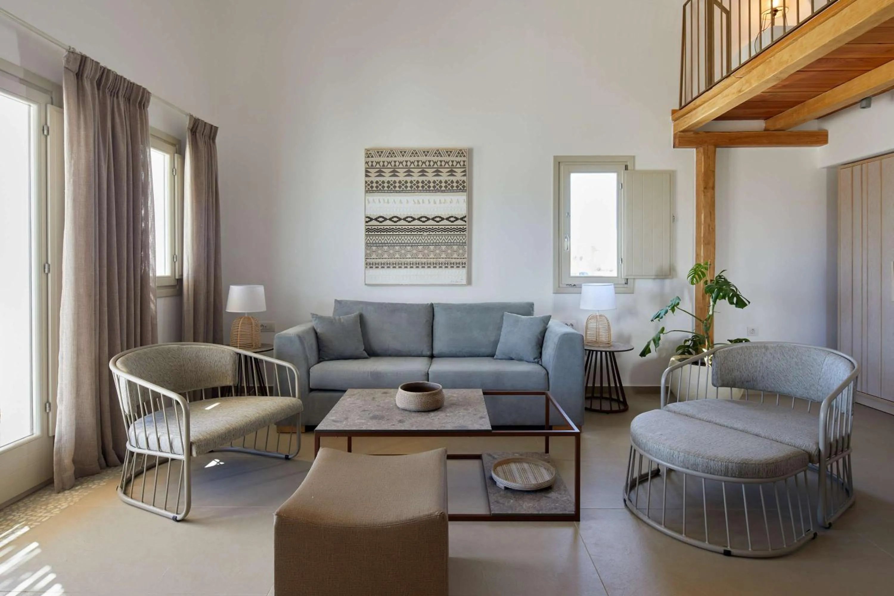 Living room in Sea Breeze Santorini Beach Resort, Curio By Hilton