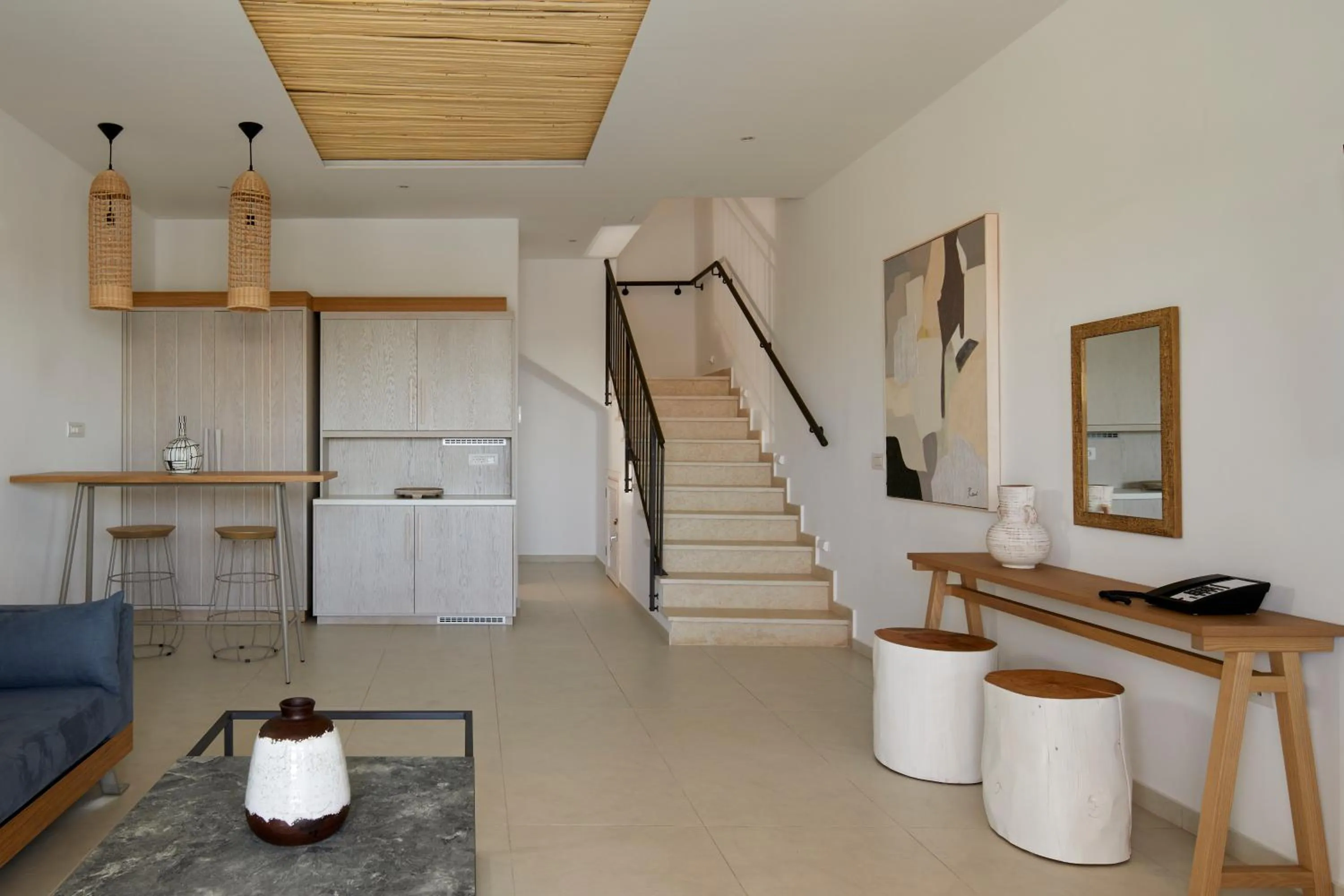 Living room in Sea Breeze Santorini Beach Resort, Curio By Hilton