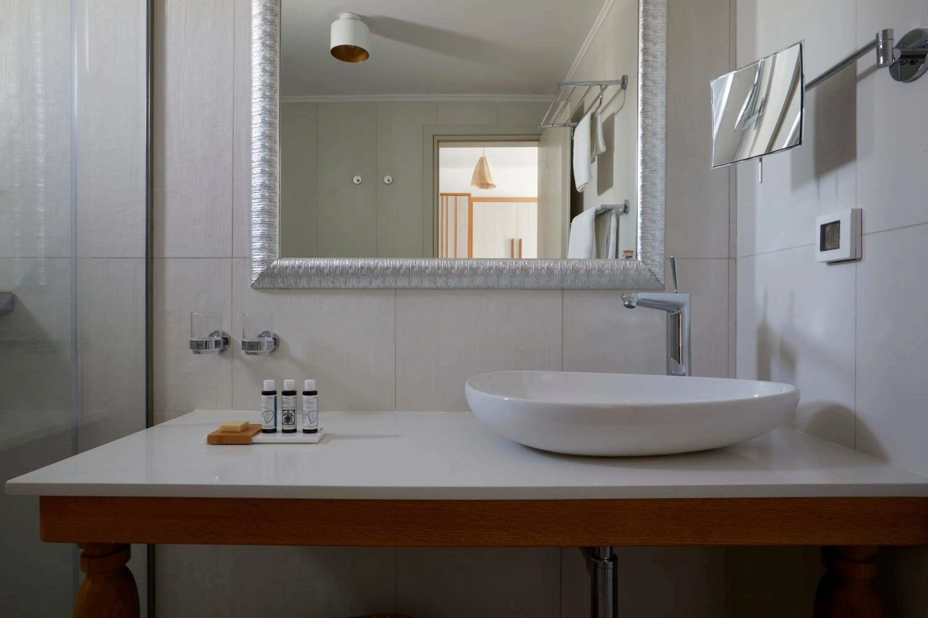 Shower in Sea Breeze Santorini Beach Resort, Curio By Hilton