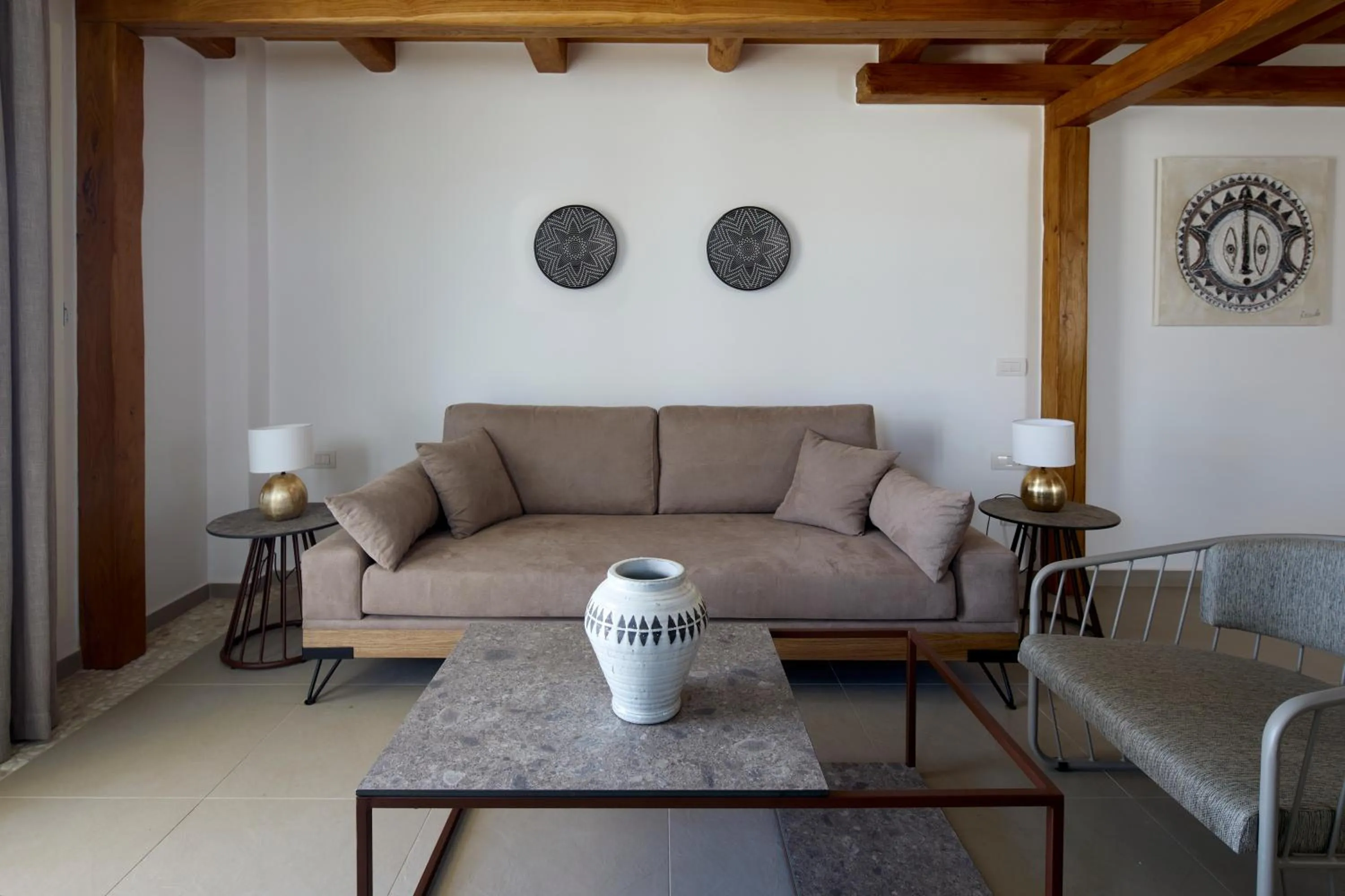 Living room in Sea Breeze Santorini Beach Resort, Curio By Hilton