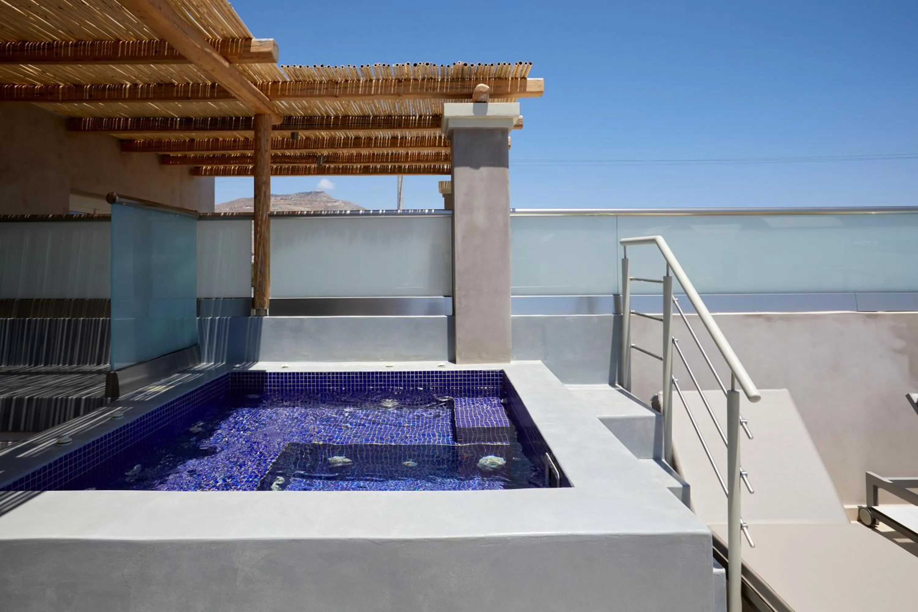 Hot Tub in Sea Breeze Santorini Beach Resort, Curio By Hilton