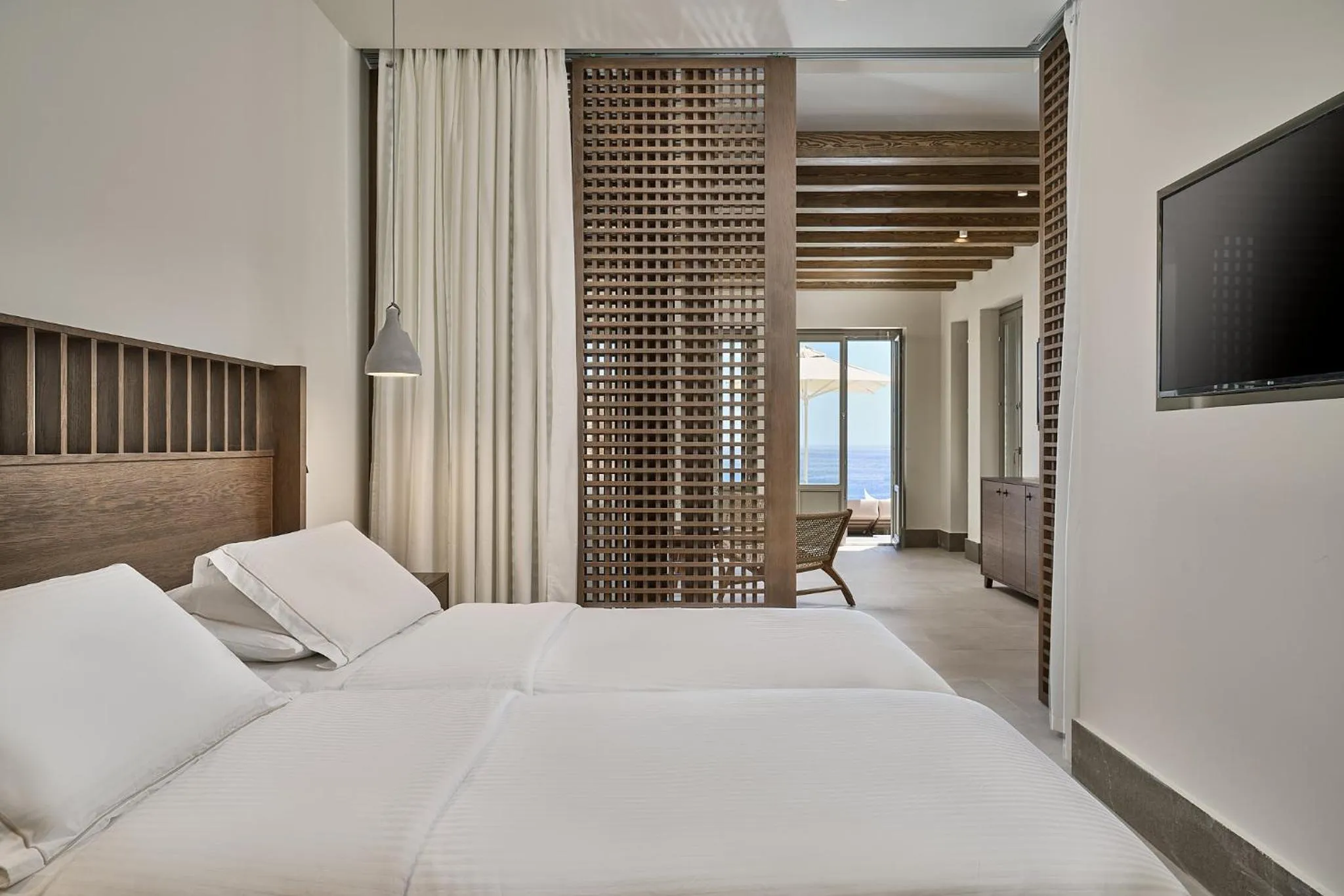 Bed in Ios Grand Pool Suites