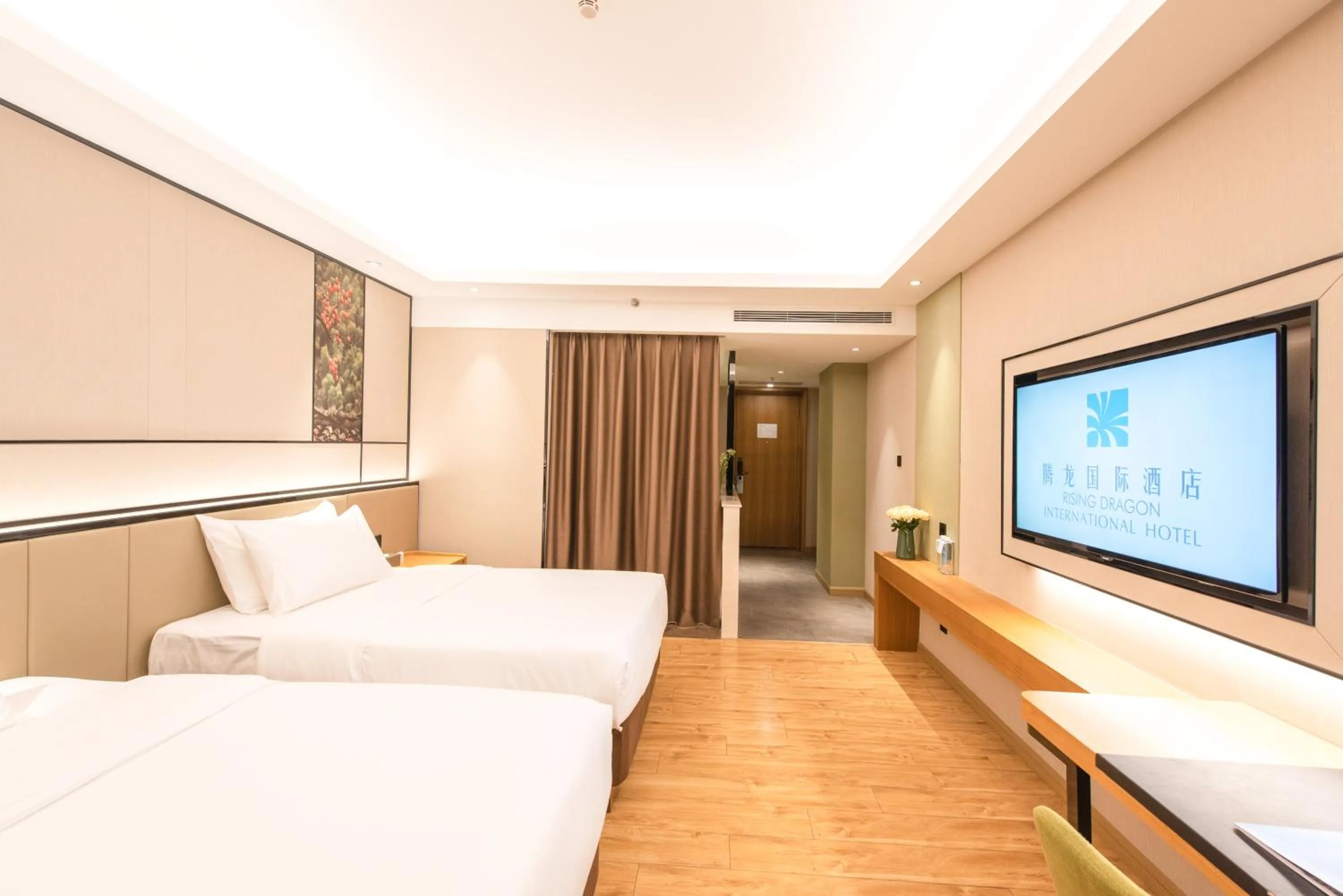 Photo of the whole room, Bed in Rising Dragon International Hotel