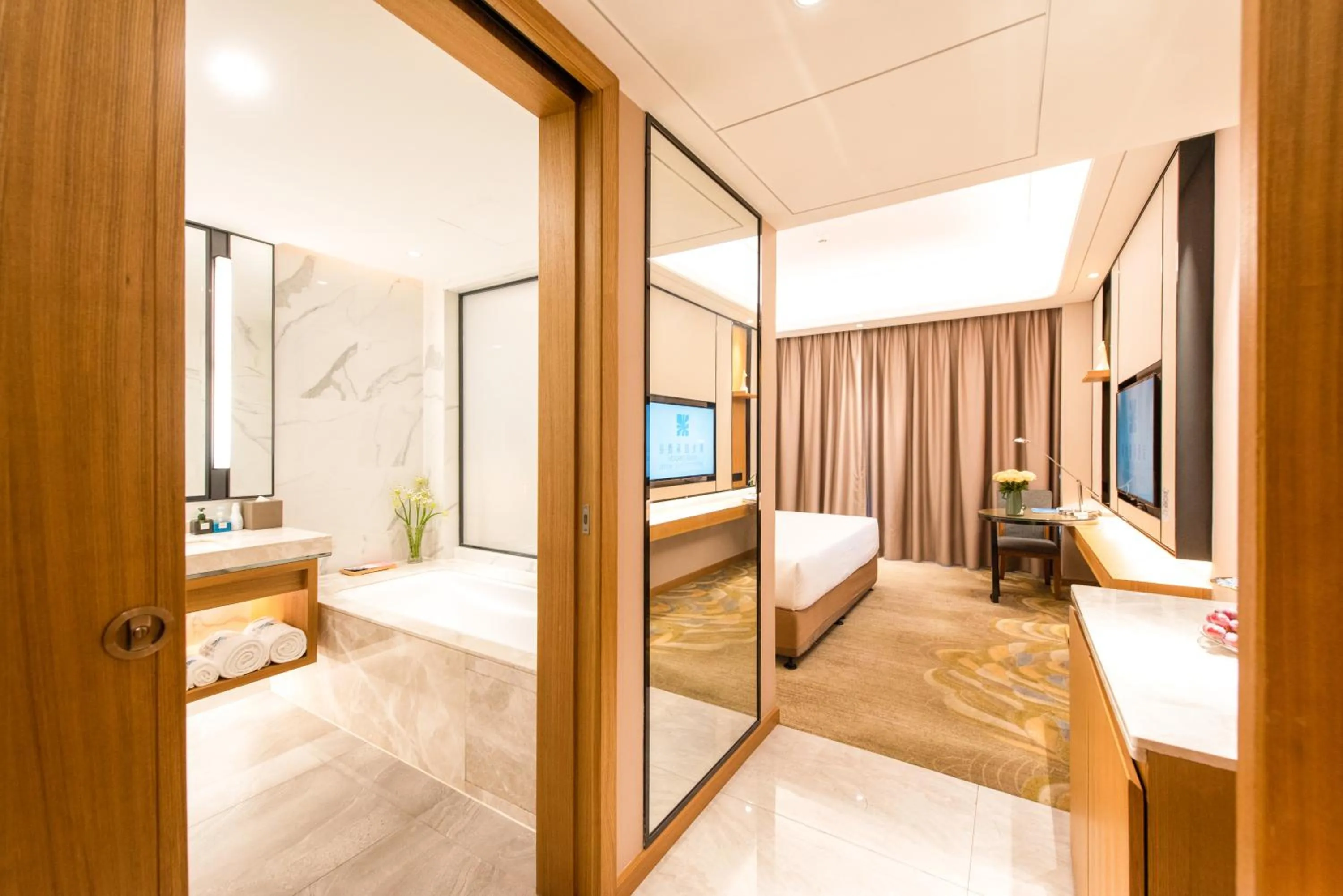 Photo of the whole room, Bed in Rising Dragon International Hotel