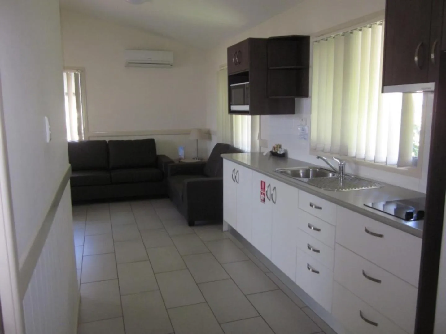 Kitchen or kitchenette in Reflections Moonee Beach - Holiday Park