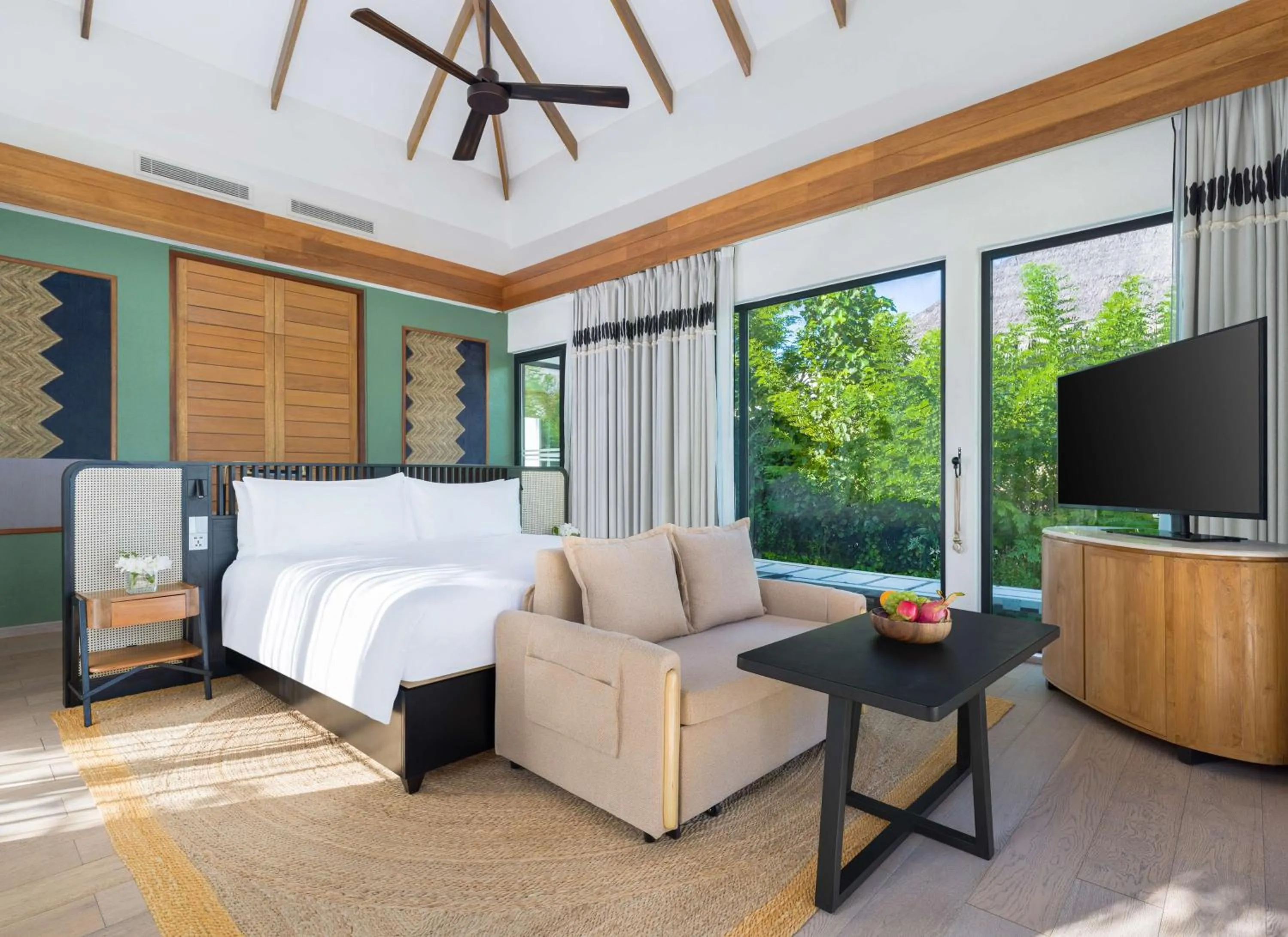 Bed in Hilton Maldives Amingiri Resort & Spa