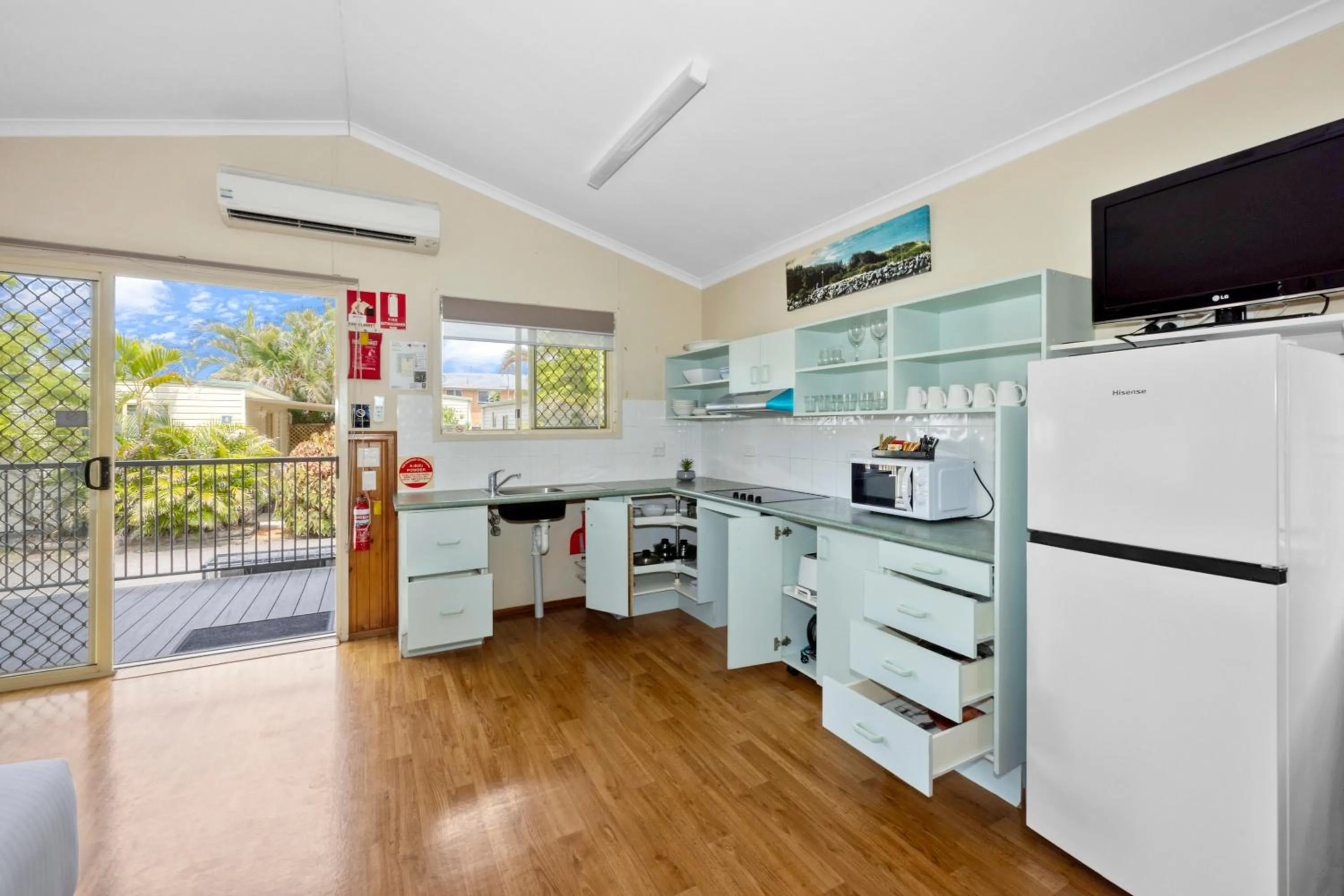 Kitchen or kitchenette in Reflections Tuncurry - Holiday Park
