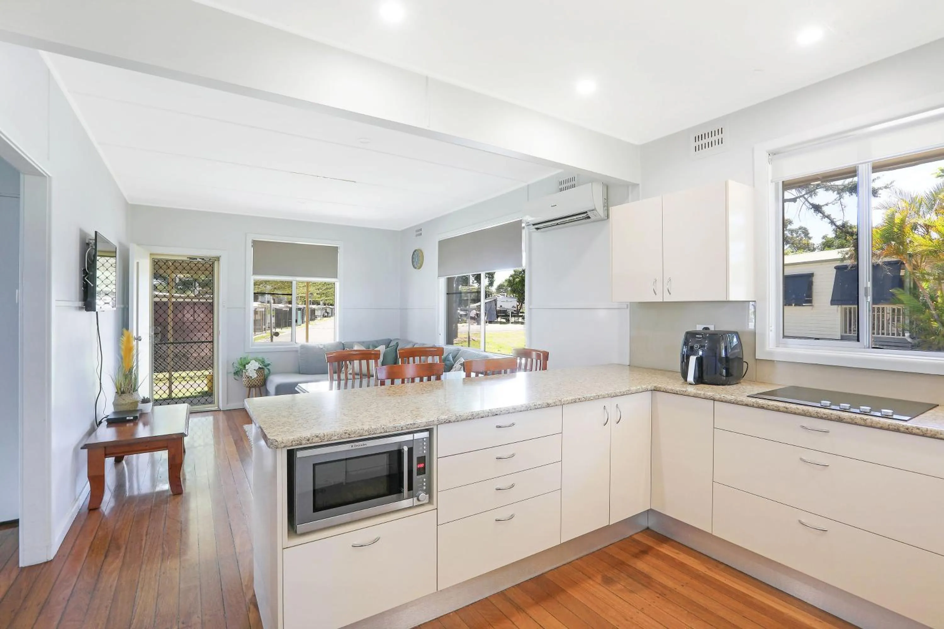 Kitchen or kitchenette in Reflections Tuncurry - Holiday Park
