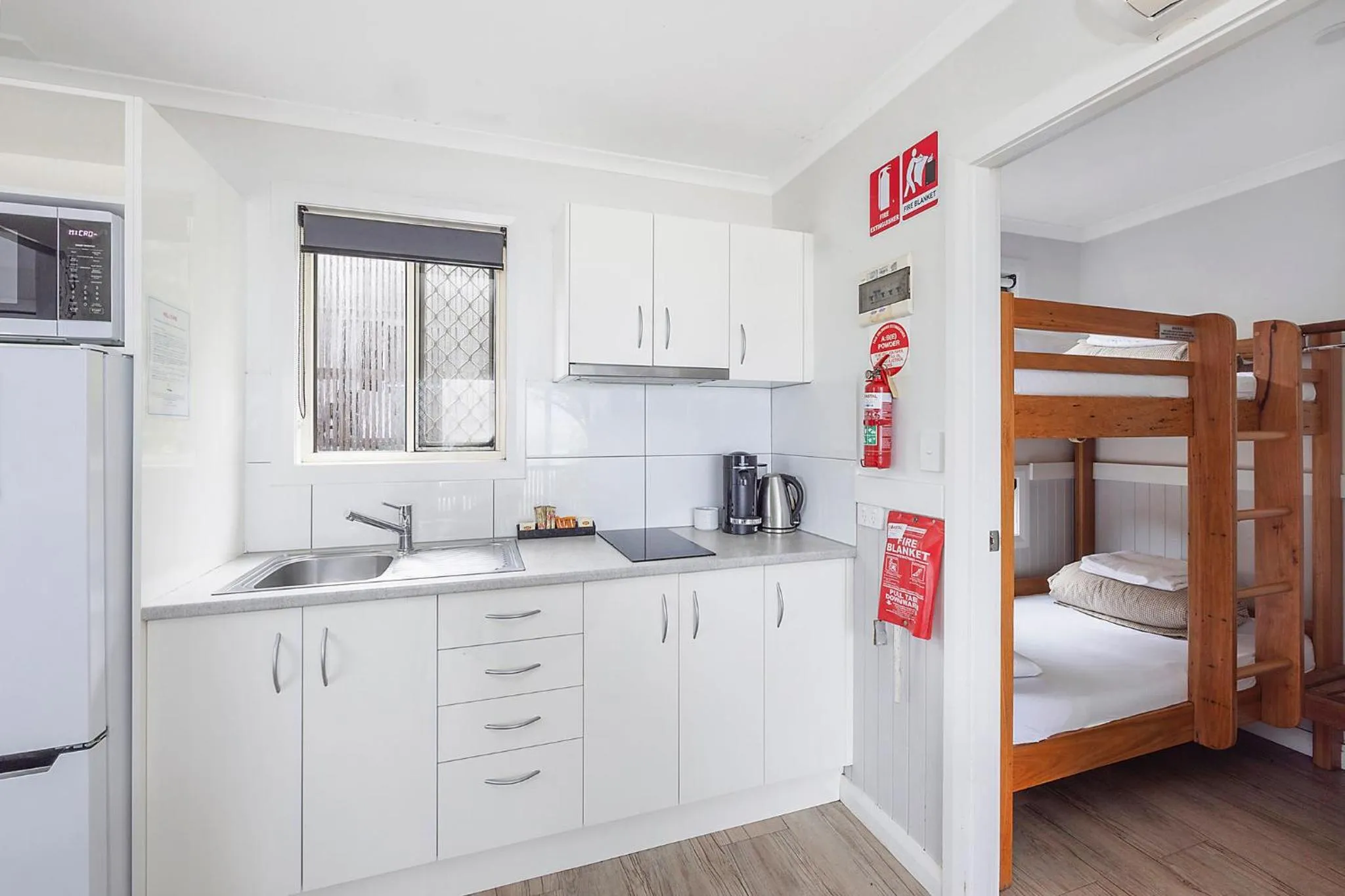 kitchen, Bed in Reflections Seal Rocks - Holiday Park