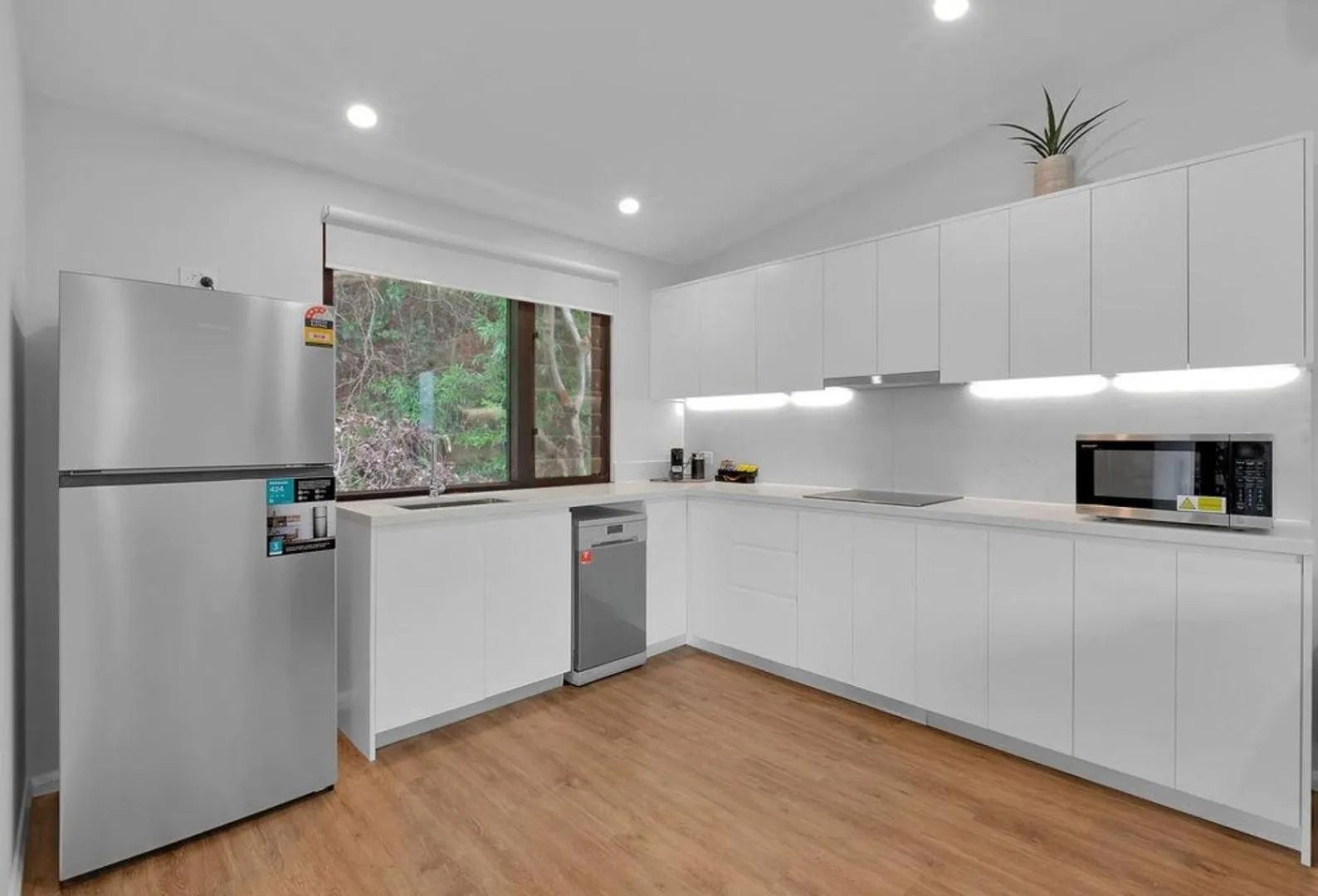 Kitchen or kitchenette in Reflections Seal Rocks - Holiday Park