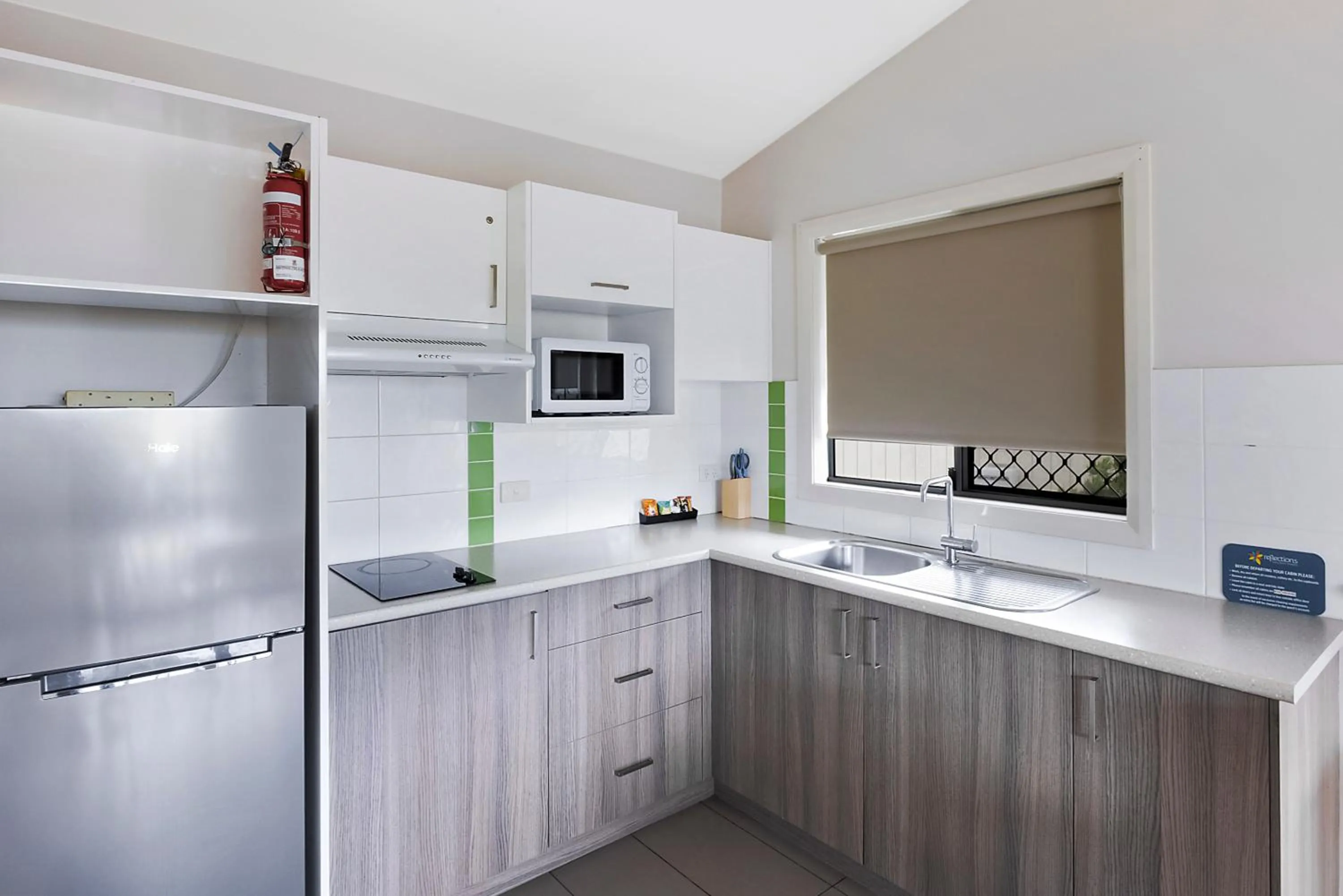 Kitchen or kitchenette in Reflections Bermagui - Holiday Park