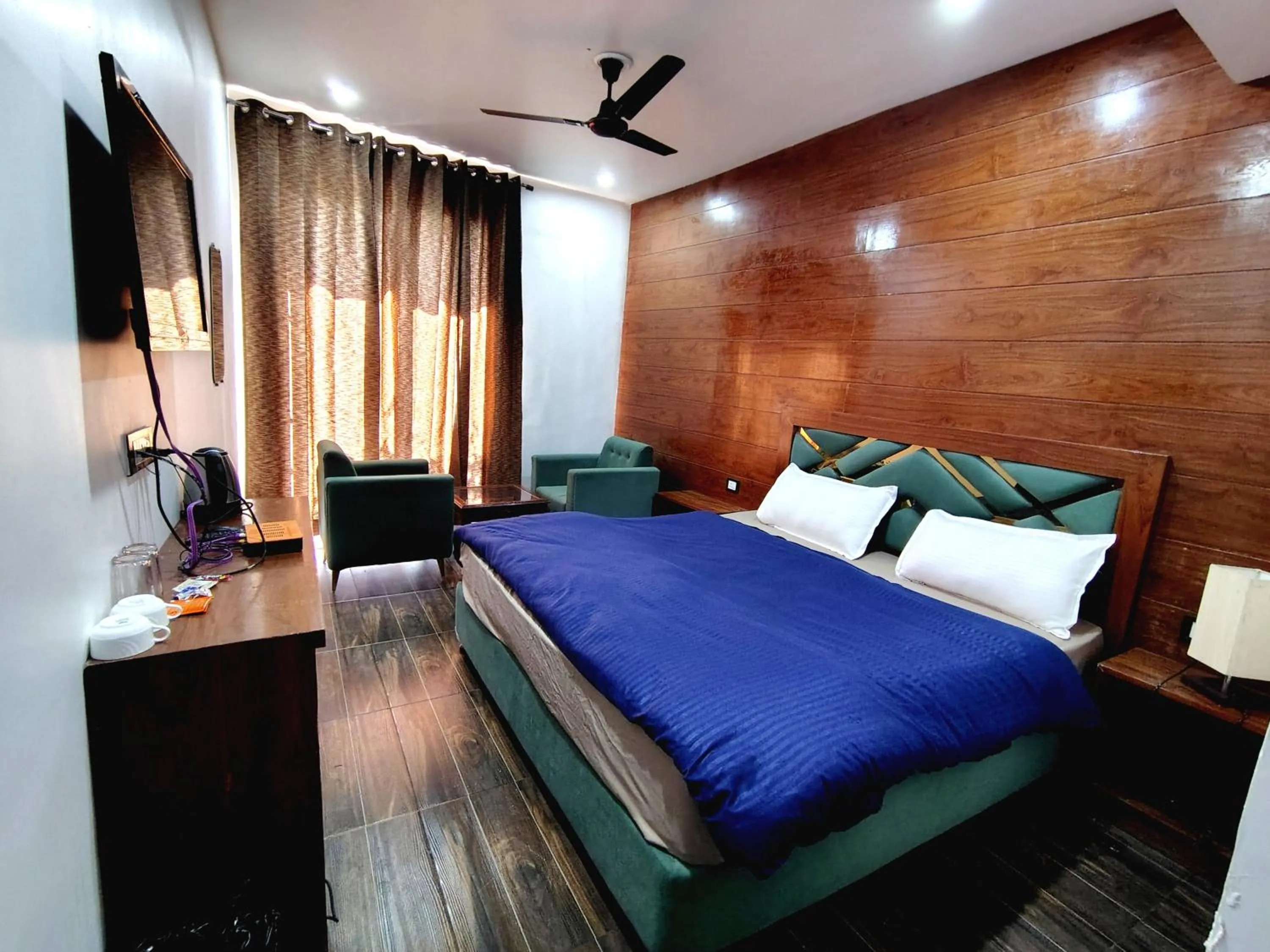 Bedroom in Chakrata Inn Resort