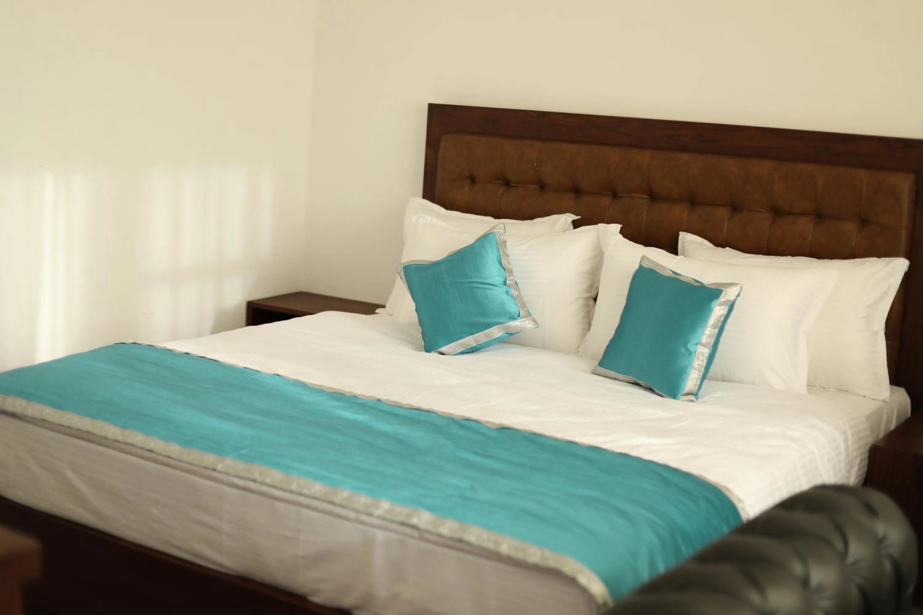 Bedroom in Chakrata Inn Resort