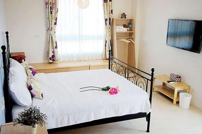 Bed in Jin Zhu Ya Homestay