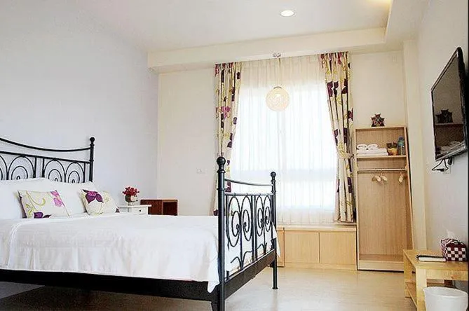 Bed in Jin Zhu Ya Homestay