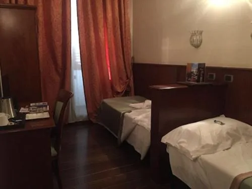 Bed in Domus Florentiae Hotel