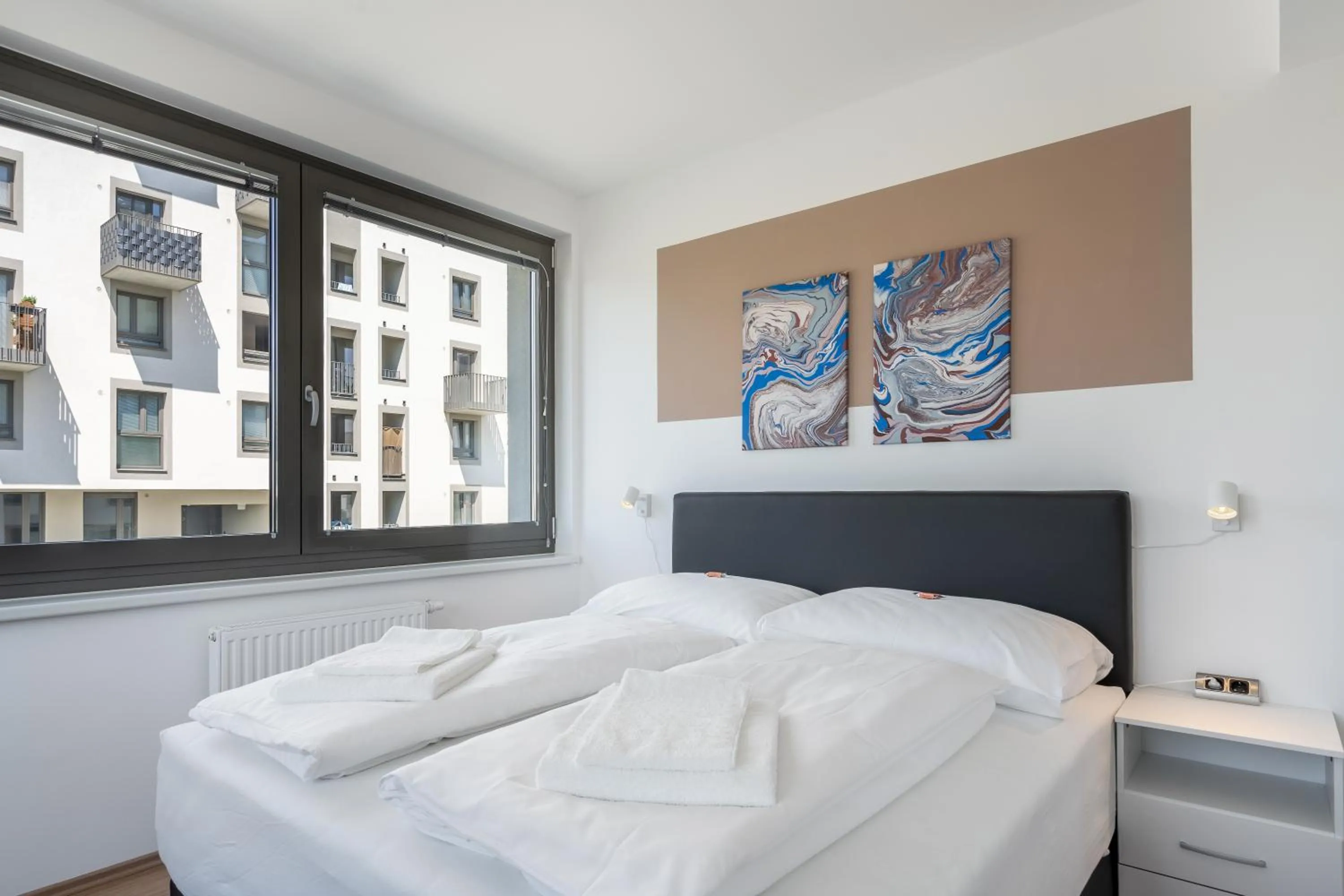 Bed in FeelGood Apartments LakeLiving inklusive Garagenplatz