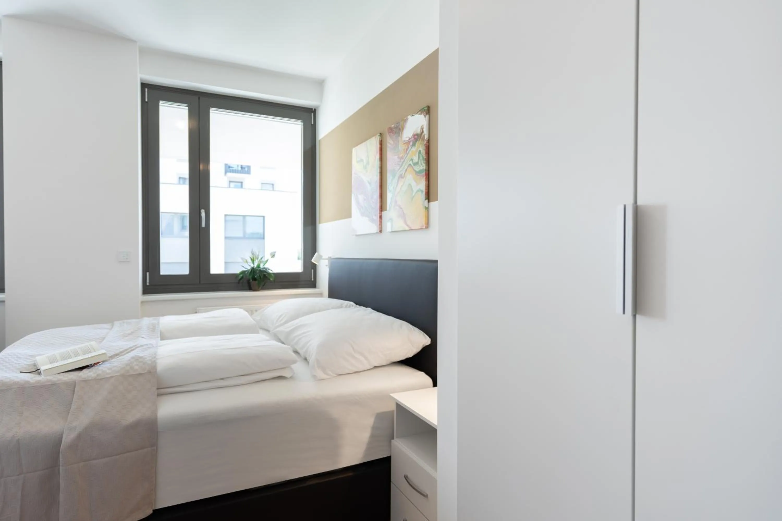 Bed in FeelGood Apartments LakeLiving inklusive Garagenplatz