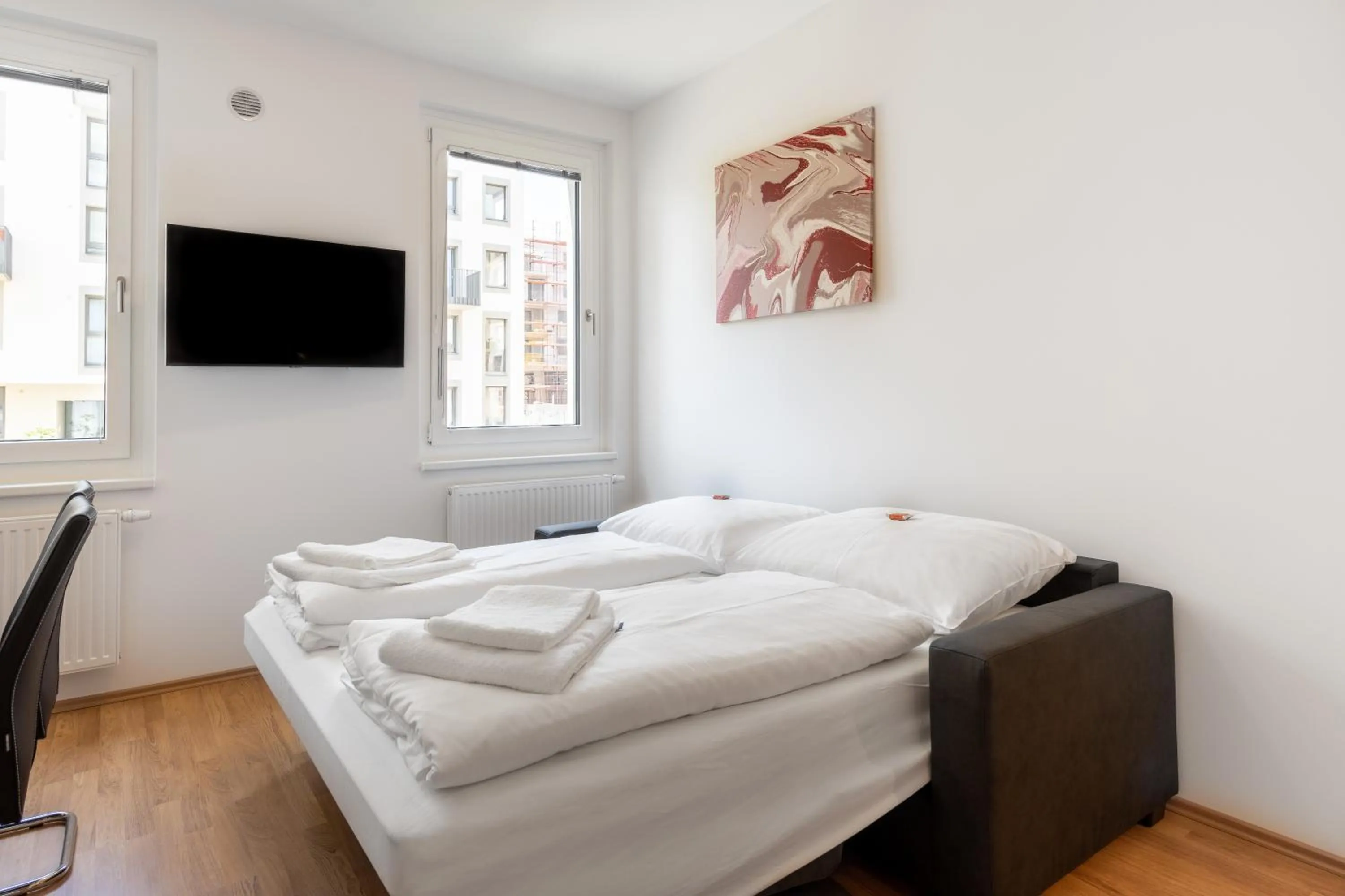TV and multimedia, Bed in FeelGood Apartments LakeLiving inklusive Garagenplatz