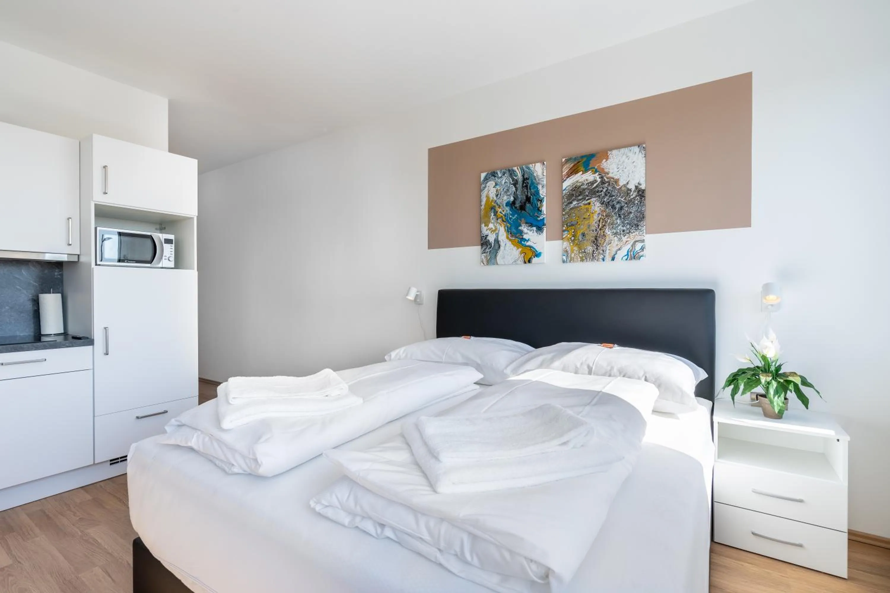 Bed in FeelGood Apartments LakeLiving inklusive Garagenplatz