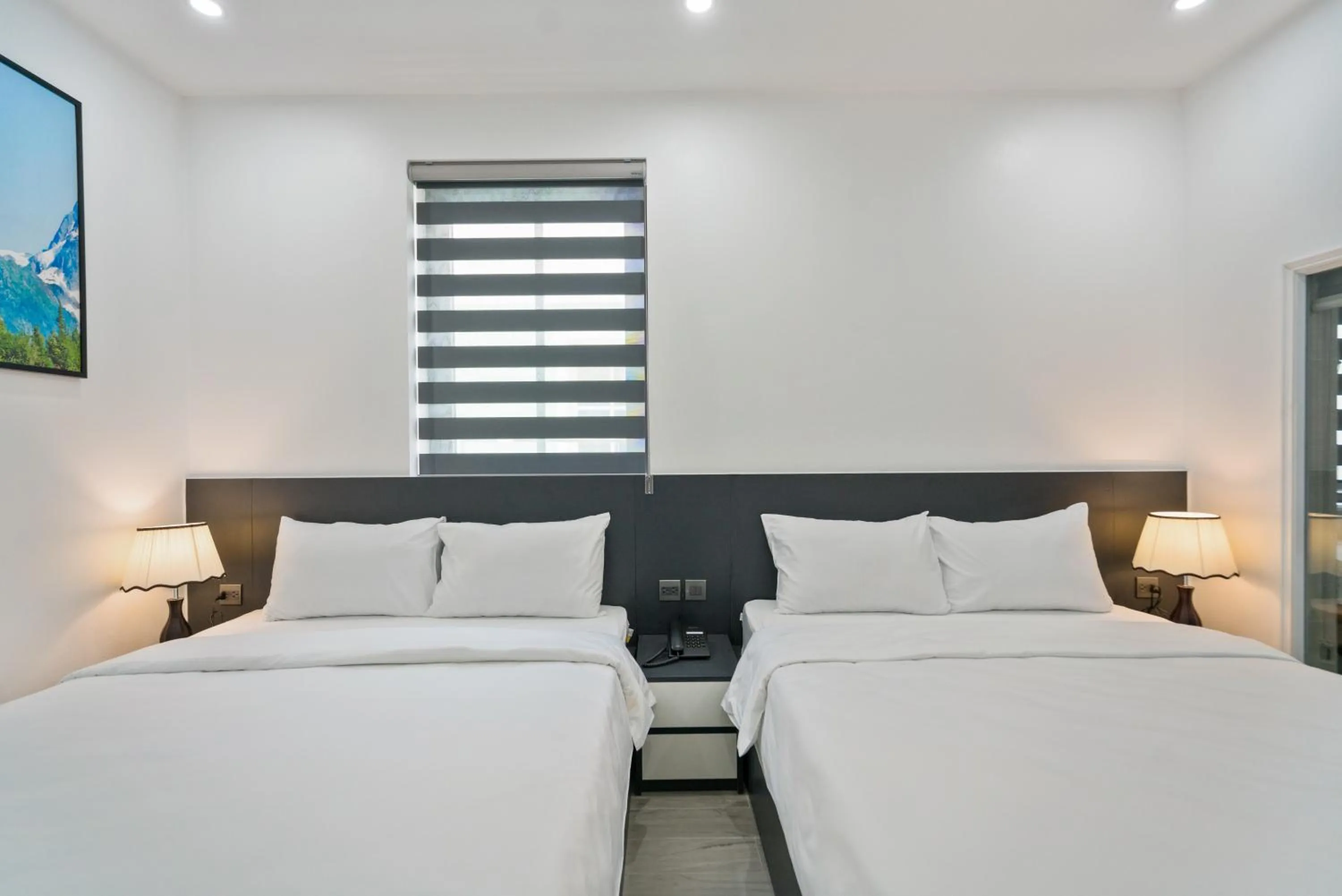 Bed in The Enchanted Ha Long Hotel