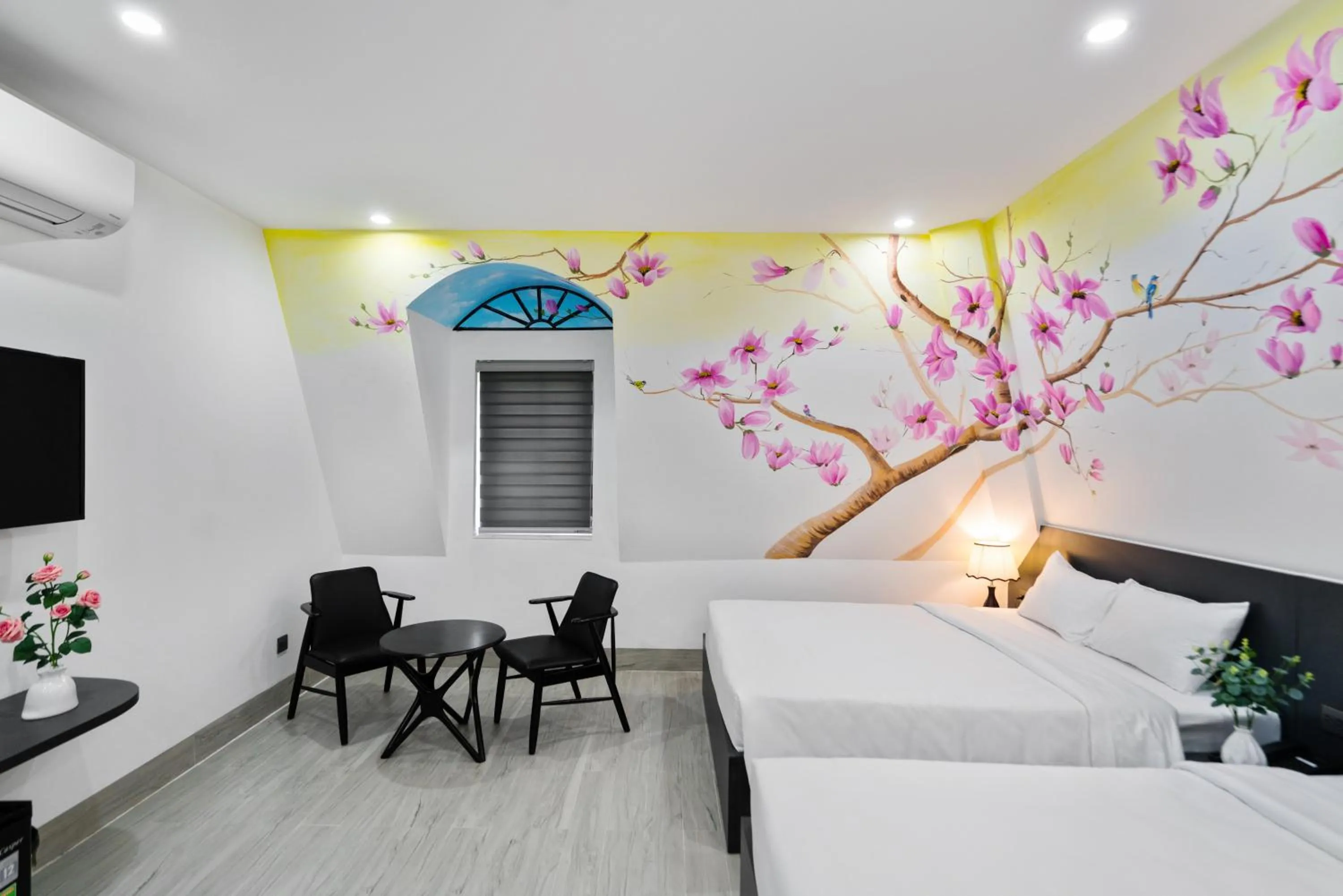 Photo of the whole room, Bed in The Enchanted Ha Long Hotel