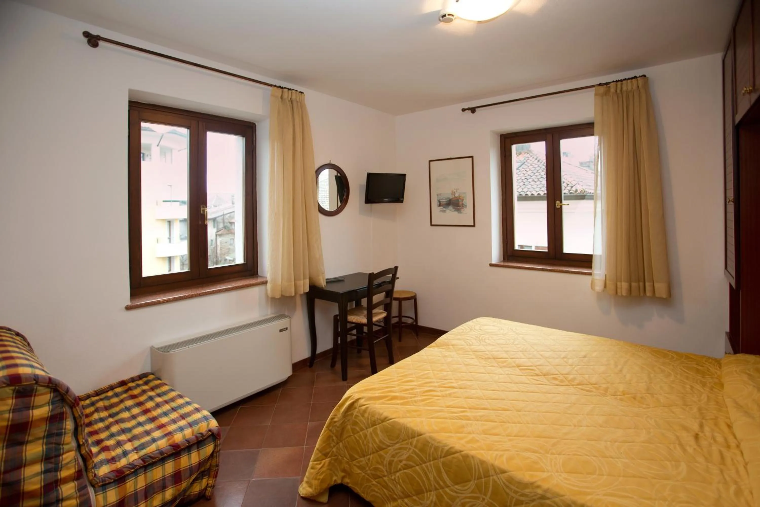 Photo of the whole room, Bed in Hotel Alla città di Trieste