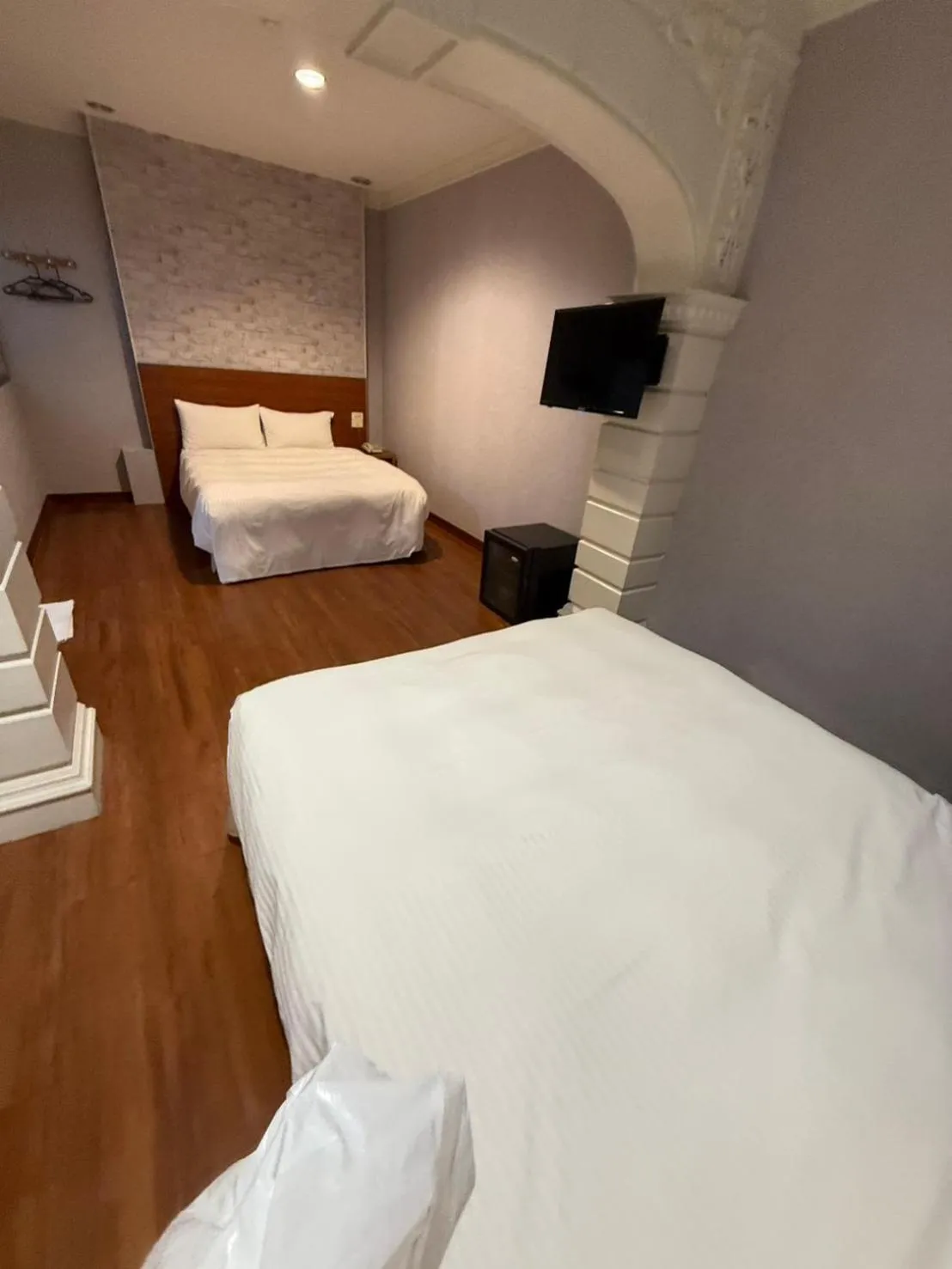 Bed in The Prince Hotel