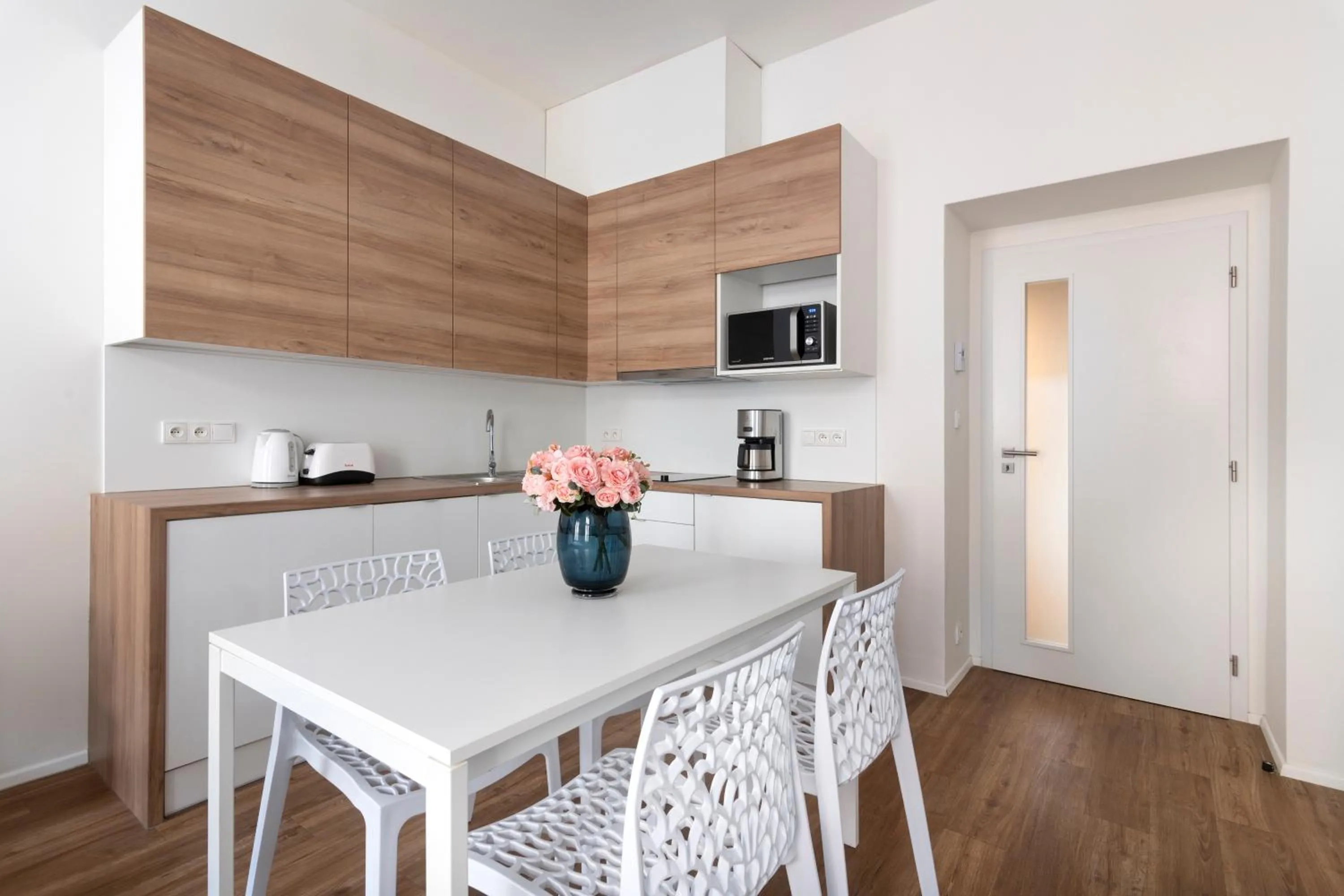 Kitchen or kitchenette in Prague Tales Boutique Residence by Dwellfort