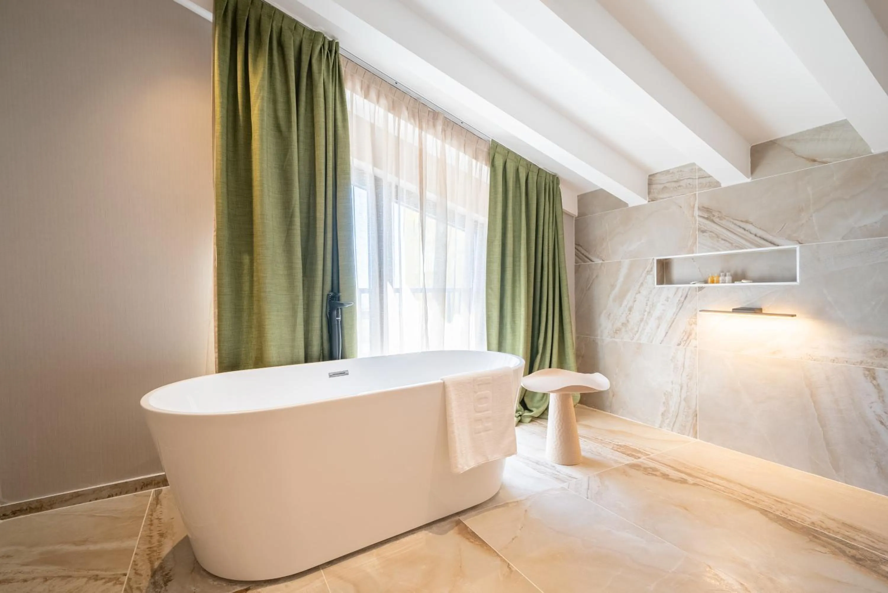 Bathroom in Hotel Millennium by Aycon