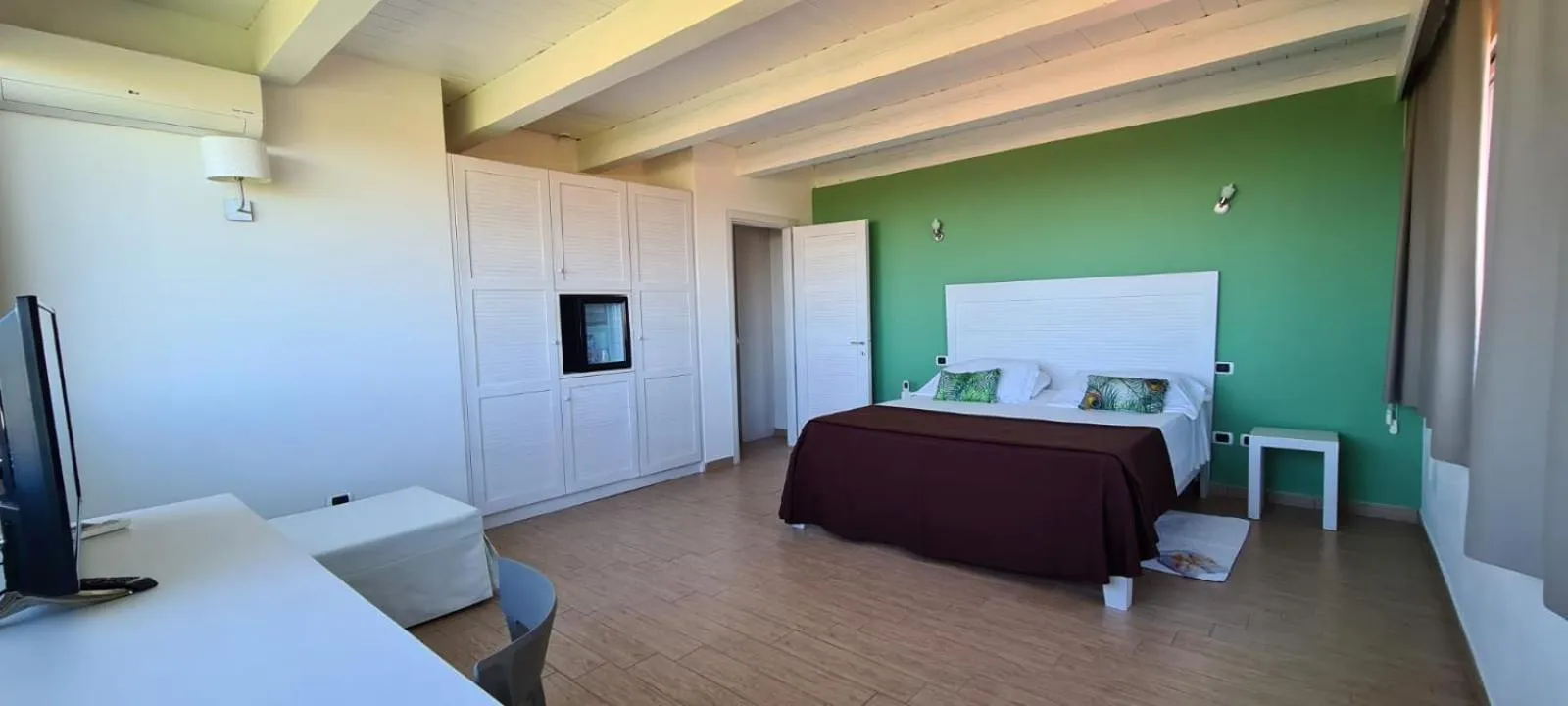 Bed in Hotel Garden Beach