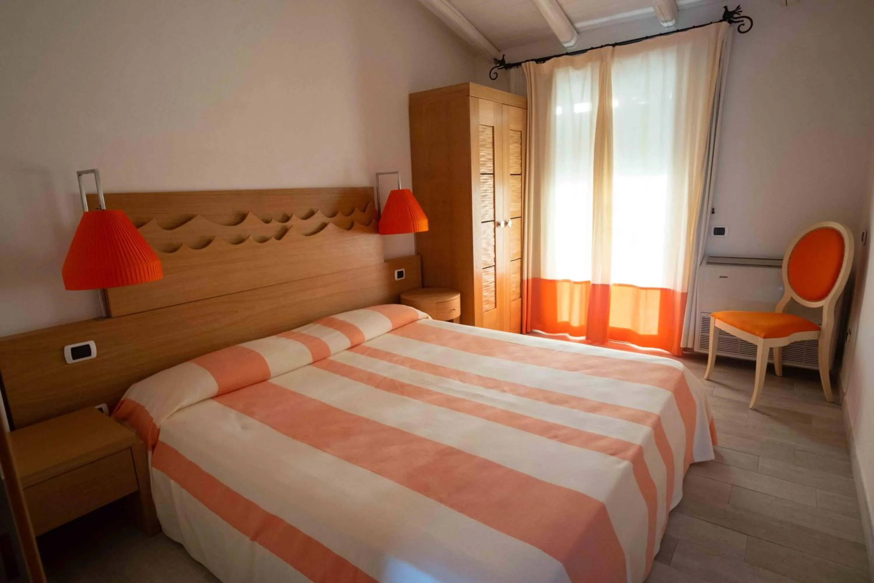 Bed in Hotel Garden Beach