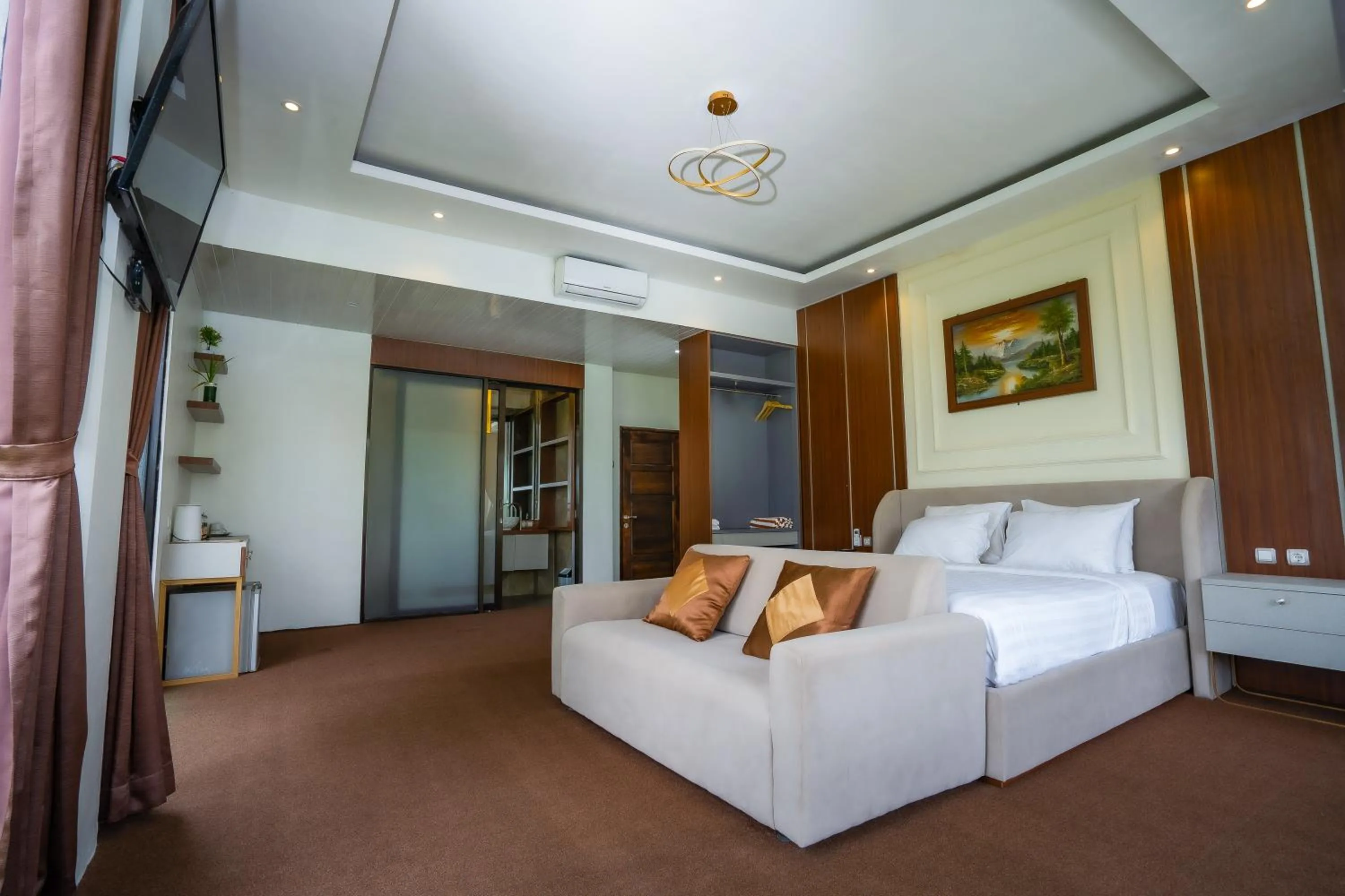 Seating area, Bed in Nirvana Hotel Resort Tetebatu