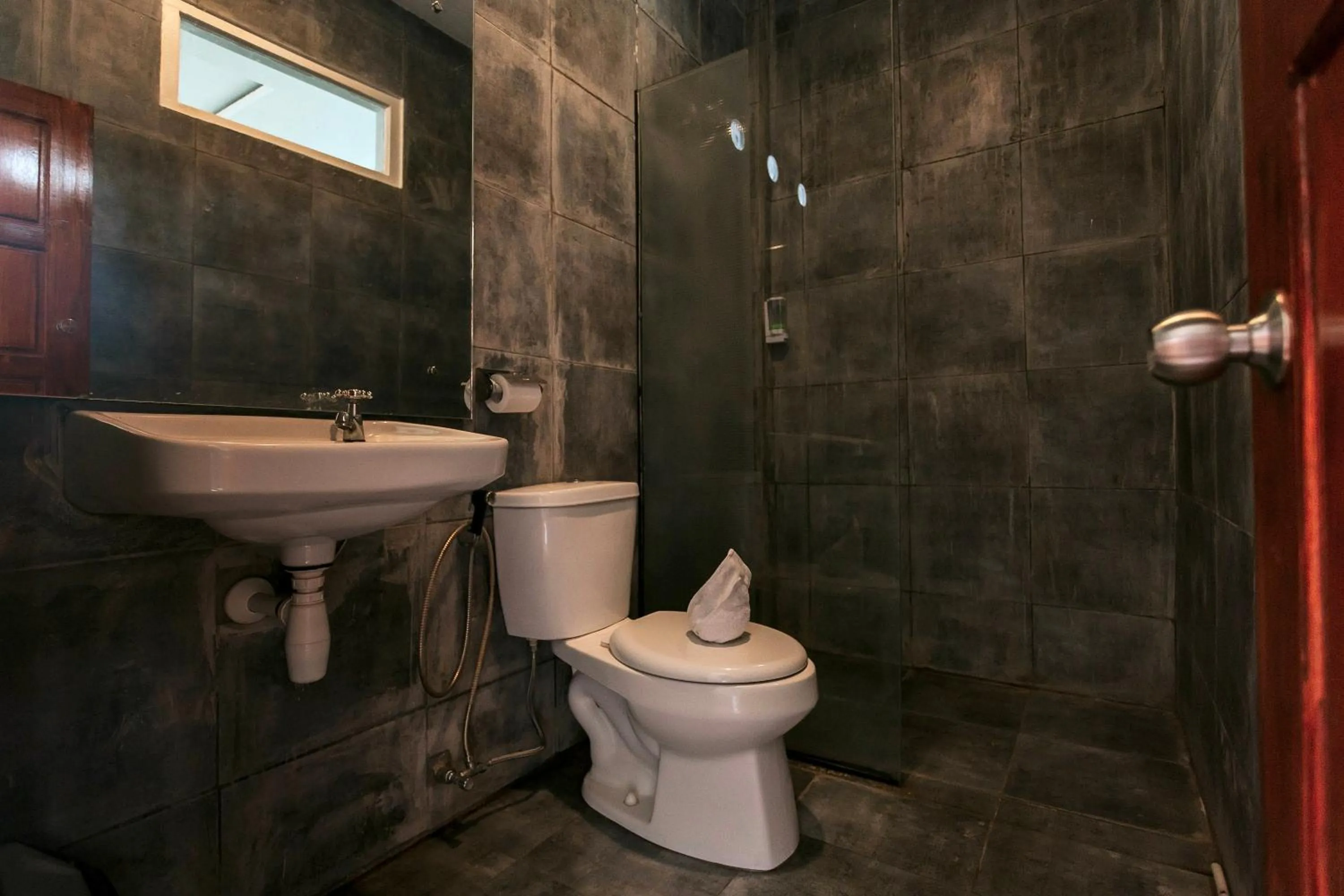 Toilet in Nirvana Hotel Resort Tetebatu