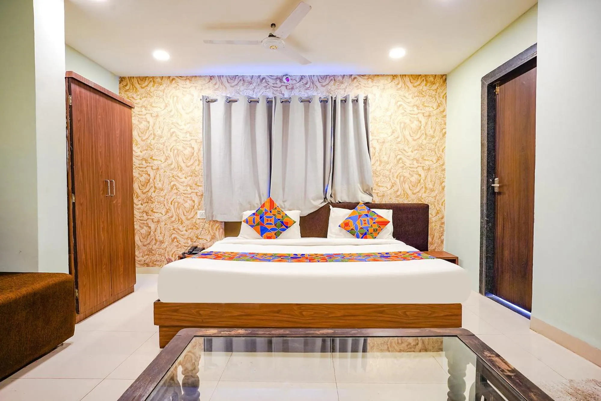 Bed in FabHotel Uday Vilas
