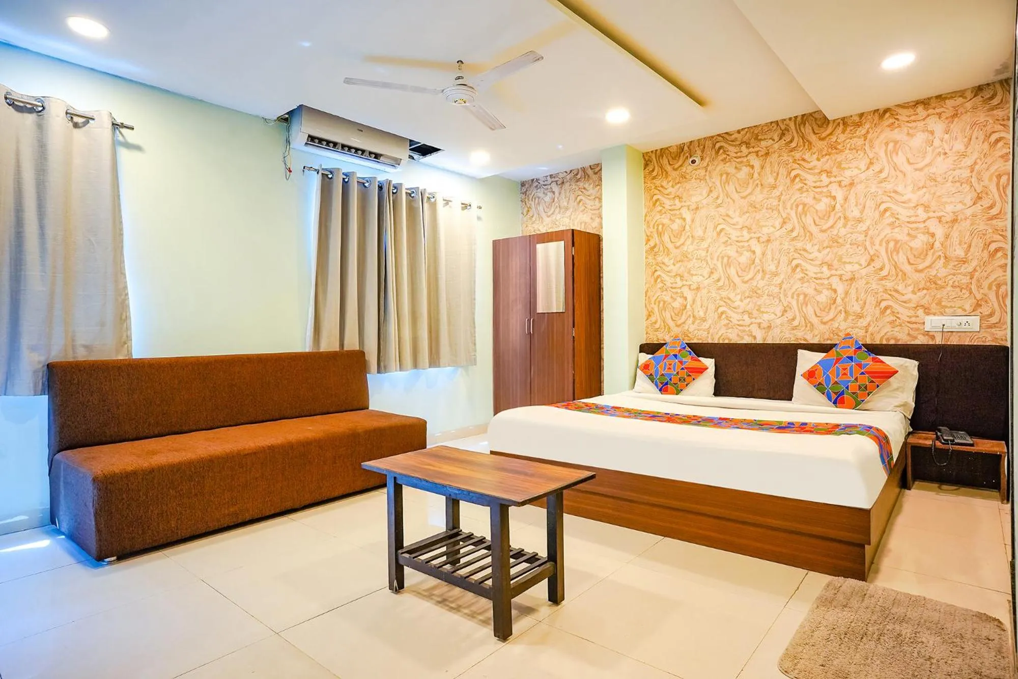 Bed in FabHotel Uday Vilas