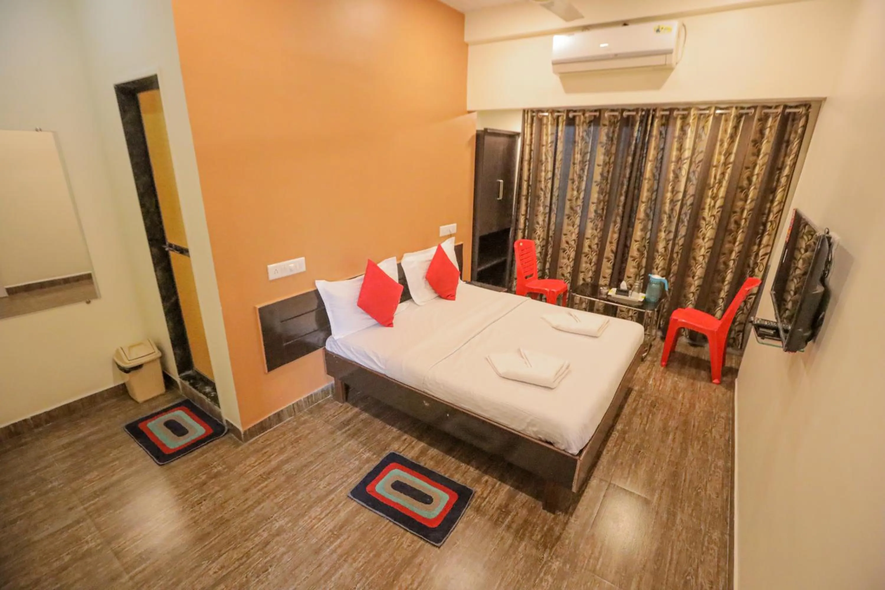 Photo of the whole room, Bed in Hotel Sai Niwas